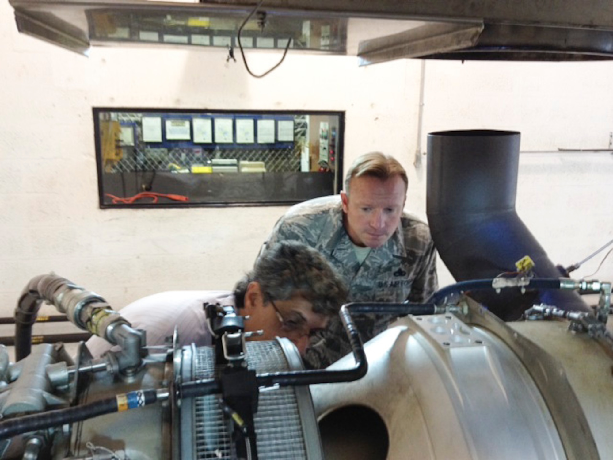 Master Sgt. Jeremy Jacobs, 12th Air Force (Air Forces Southern) Tactical Aircraft Manager, observes a demonstration of different techniques for performing proper maintenance procedures on the PT6A turboprop engine on Dec. 15, 2014 in Miami, Fl. The PT6A turboprop engine is a powerhouse that offers high performance, reliability and value in its ability to power air craft across multiple platforms and is used by 170 different countries worldwide. (Courtesy Photo)