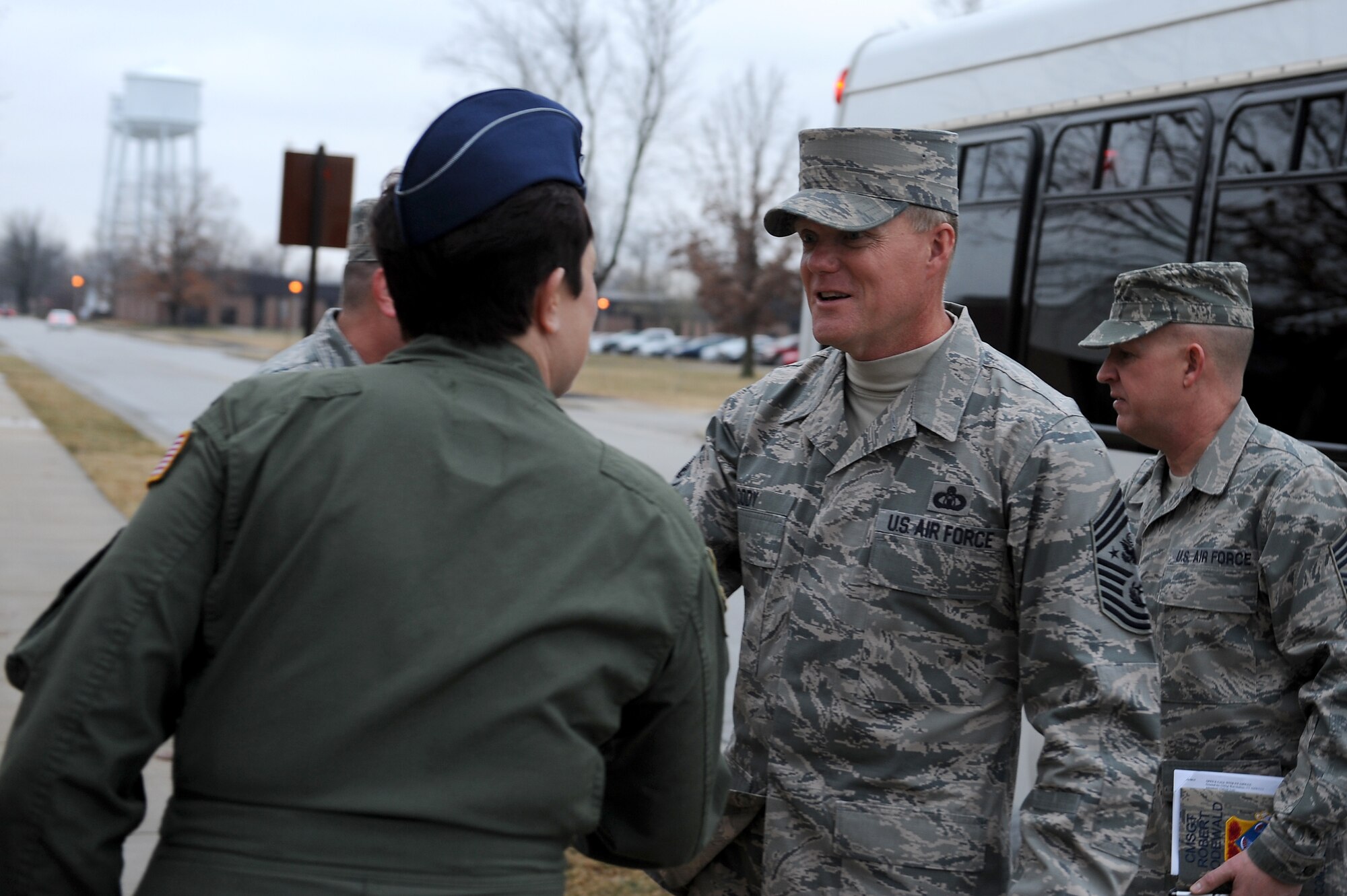 Chief Master Sgt. of the Air Force James Cody greets Col. Jeanette Voight, 375th Operations Group commander, during a visit to Scott Air Force Base, Illinois, Jan. 12, 2015. Cody visited a number of units around the base such as the 375th OG, 375th Communications Group and Air Mobility Command. (U.S. Air Force photo/Staff Sgt. Jonathan Fowler)