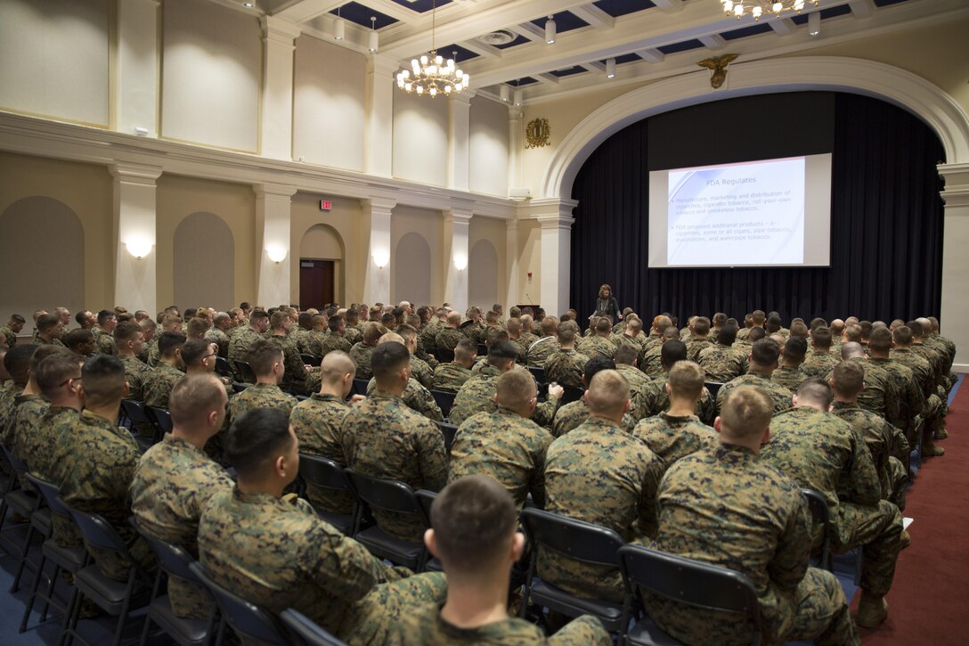 Marines receive a class on the effects of tobacco use from MCCS employee Jamie Morris at Marine Barracks Washington, D.C., Jan. 13th, 2015. The class was one in a series of annual Back in the Saddle training classes. (U.S. Marine Corps photo by Lance Cpl. Christian Varney/Released)