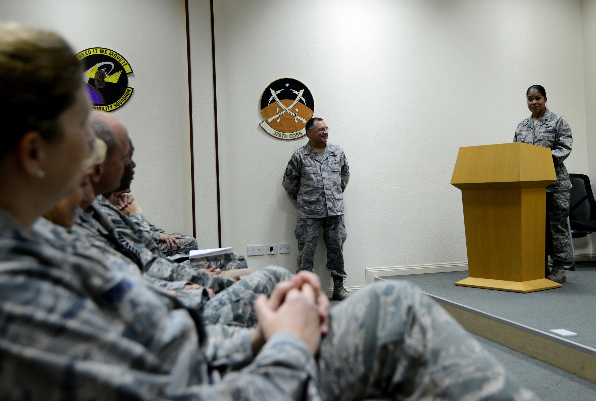 U.S. Air Force Lt. Col. June Oldman, right, Evacuation Squadron commander, gives closing remarks during the 379th Expeditionary Aeromedical change of command ceremony, Jan. 14, 2015, at Al Udeid Air Base, Qatar. Oldman assumed command of the 379th EAES from Col. Janet Sessums, who will redeploy to her home unit, the 137th Aeromedical Evacuation Squadron at Will Rogers Air National Guard Base, Okla., where she is the director of operations. (U.S. Air Force photo by Senior Airman Kia Atkins)