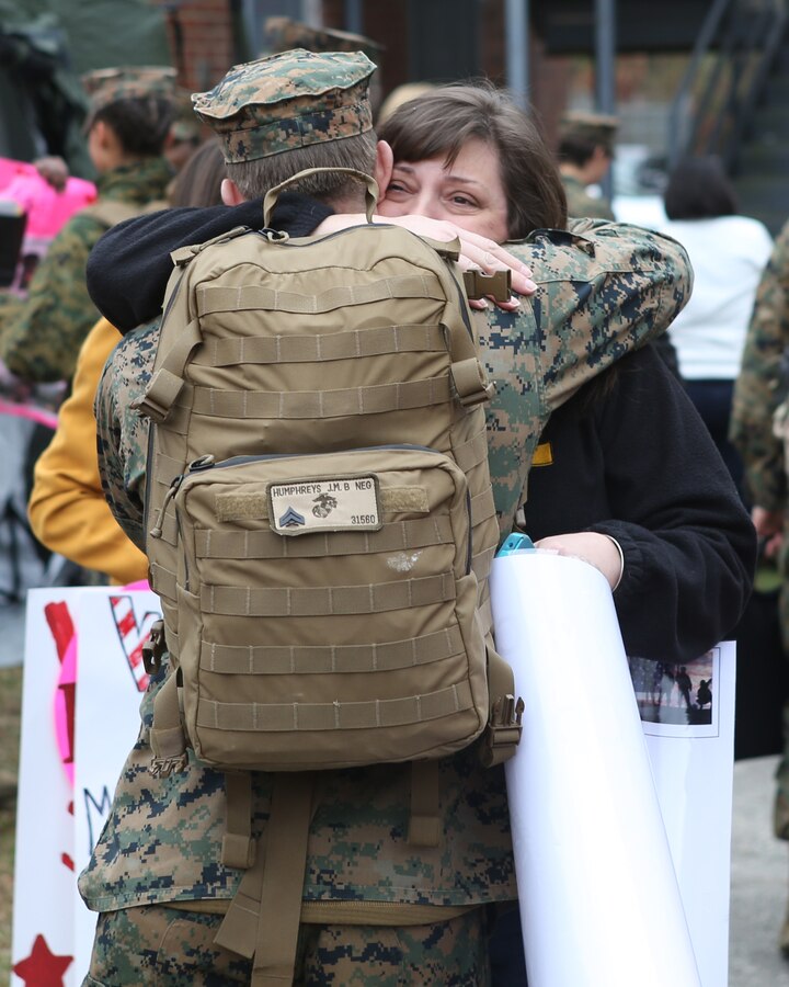 Friends and family members of U.S. Marines with the 26th Marine Expeditionary Unit (MEU) wait for the return of their Marines from deployment at the 26th MEU command post, Camp Lejeune, N.C., Jan. 13, 2015. The Marines were deployed in support of the Special Purpose Marine Air-Ground Task Force Crisis Response-Africa. (U.S. Marine Corps photo by Gunnery Sgt. Andrew D. Pendracki/Released)