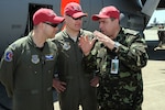 Lt. Col. Dennis Bailey of the North Carolina Air National Guard's 145th Airlift Wing and Lee Burwell of the North Carolina Forest Service provide a preflight briefing to the crew on the first day of flying for the Modular Airborne Firefighting System training exercise in Greenville, S.C., April 26, 2010. Aircrews from three Air National Guard and one Air Force Reserve units provide assistance to the U.S. Forest Service, state and local agencies, and the National Interagency Fire Center in battling large, uncontrolled wildfires throughout the nation.