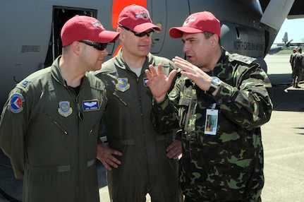 Lt. Col. Dennis Bailey of the North Carolina Air National Guard's 145th Airlift Wing and Lee Burwell of the North Carolina Forest Service provide a preflight briefing to the crew on the first day of flying for the Modular Airborne Firefighting System training exercise in Greenville, S.C., April 26, 2010. Aircrews from three Air National Guard and one Air Force Reserve units provide assistance to the U.S. Forest Service, state and local agencies, and the National Interagency Fire Center in battling large, uncontrolled wildfires throughout the nation.