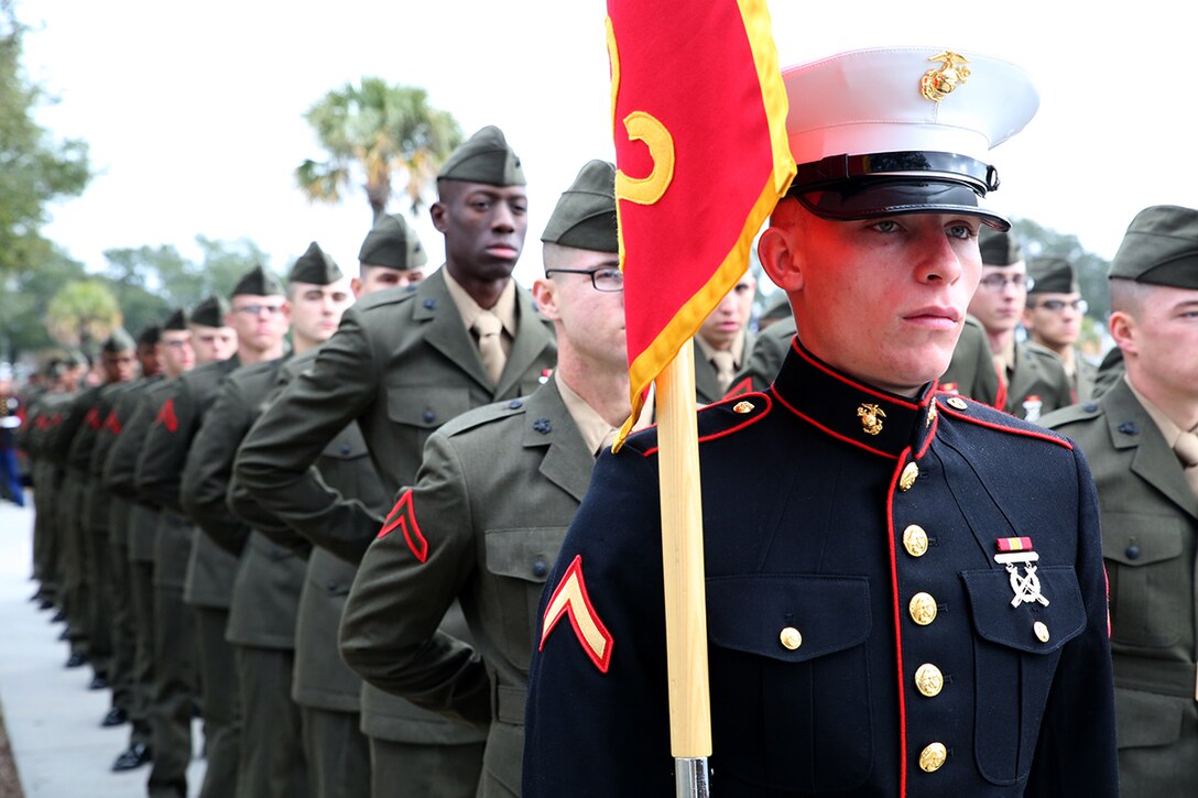 Pfc. Tyler S. Faaborg, honor graduate of platoon 2002, awaits graduation at Marine Corps Recruit Depot Parris Island, S.C., Jan. 16, 2015. Faaborg, a Tampa, Fla. native, was recruited by Staff Sgt. Sgt. Cheops Dieujuste, a recruiter from Recruiting Substation Temple Terrace, Recruiting Station Jacksonville. Recruit training signifies the transformation of a civilian to a United States Marine. Upon graduation, the newly-minted Marines will receive ten days of leave before attending the School of Infantry East, Camp Geiger, N.C. The Marine will be trained in basic infantry skills to ensure Marines are combat-ready. (Official Marine Corps photo by Cpl. John-Paul Imbody)