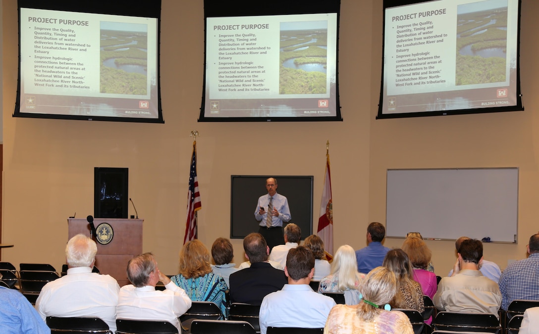 Dr. Brad Foster, Jacksonville District’s Planning Technical Lead for the Loxahatchee River Watershed Restoration Project, provides a project overview during the public scoping meeting held Jan. 12 in Stuart, Fla.
