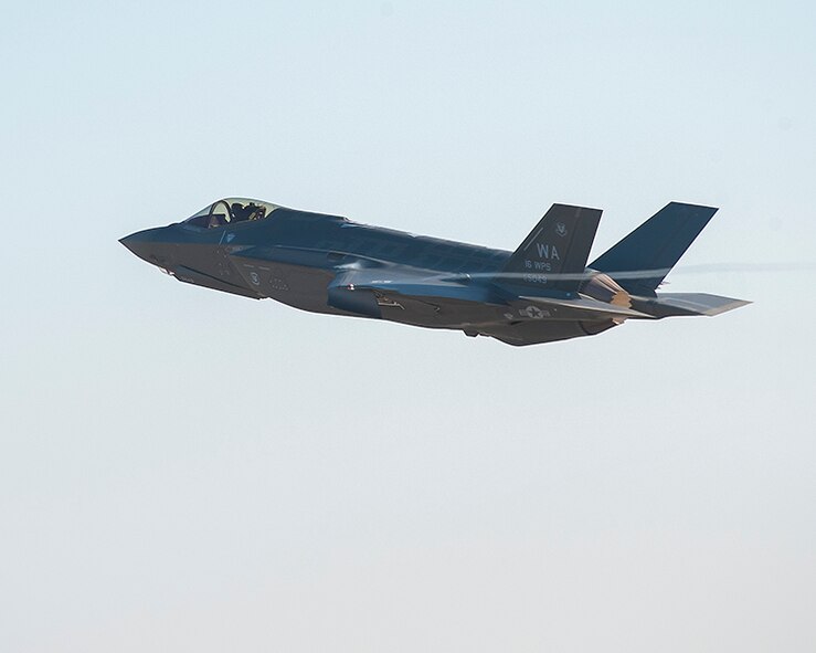 An F-35A Lightning II, piloted by Capt. Brent Golden, launches from the Lockheed Martin plant Jan. 15, 2015, in Fort Worth, Texas. Golden flew the F-35 directly from the Lockheed plant to its new home in at Nellis Air Force Base, Nev. Golden in a 16th Weapons Squadron instructor. (Courtesy photo/Randy Crites, Lockheed Martin)
