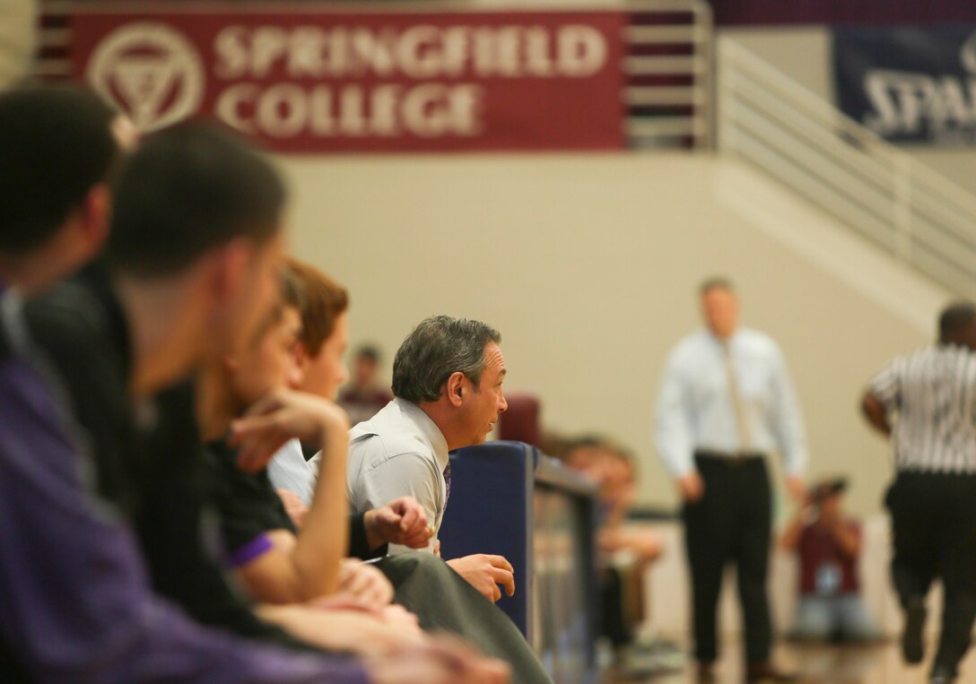 Steve Ray,the head coach of Pittsfield High School, watches his team preform during the 2015 Spauling Hoophall Classic. The event brought together the top 52 teams to compete at Springfield, Massachusetts, Jan.15. The United States Marine Corps began sponsoring the event on Nov. 12, 2014 as a way to give back to the community by instilling motivation in the attendees and athletes. (U.S. Marine Corps photo by Cpl. Elizabeth Thurston/Released) 