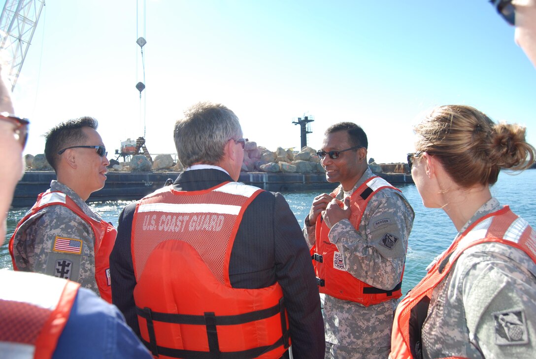 U.S. Army Corps of Engineers Commanding General Lt. Gen. Thomas Bostick (2nd from right) discusses repairs to the Port of Long Beach middle breakwater with (from left) South Pacific Division Commander Brig. Gen. Mark Toy, Corps Project Manager Jim Fields and Los Angeles District Commander Col. Kimberly Colloton during a Jan. 15 visit to the port.