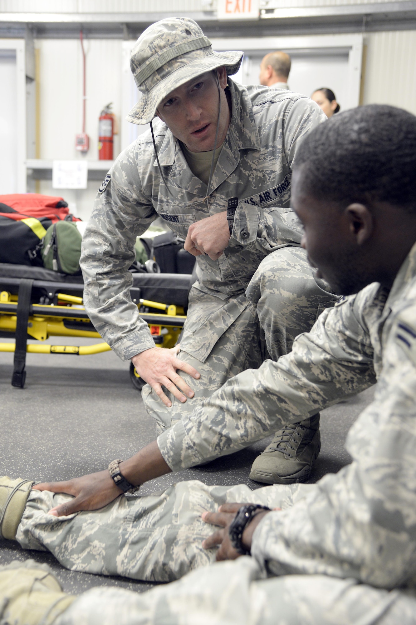 Staff Sgt. Joshua, medical technician, responds to a call for a sprained ankle during a training exercise at an undisclosed location in Southwest Asia Jan. 15, 2015. Airmen participating in the exercise were given the opportunity to receive first-hand experience as well as a learning experience on possible disease outbreaks. Joshua is currently deployed from Joint Base Langley-Eustis, Va., and is a native of Celina, Ohio. (U.S. Air Force photo/Tech. Sgt. Marie Brown)