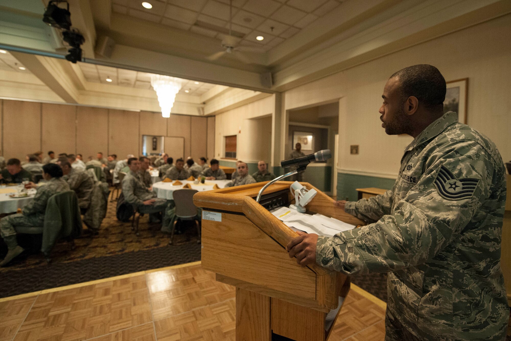 Tech. Sgt. Lavar Plummer, 8th Civil Engineer Squadron structural craftsman, echoed a portion of Dr. King’s “I Have a Dream” speech during the Martin Luther King Jr. Day luncheon Jan. 16, 2015, at Kunsan Air Base, Republic of Korea. More than 50 Wolf Pack Airmen attended the event to pay homage to the historical impact of American civil rights activist Dr. King. (U.S. Air Force photo by Senior Airman Katrina Heikkinen/Released)
