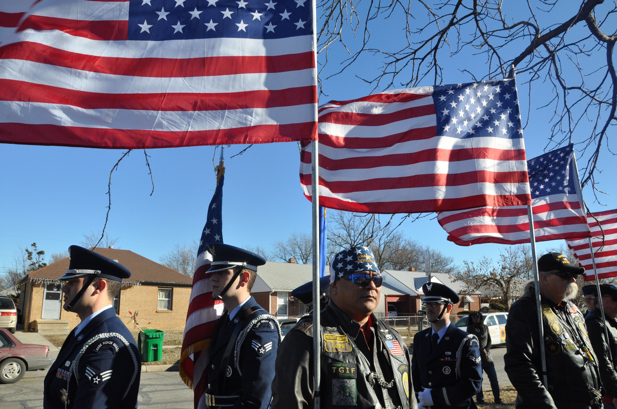Airmen from the 22nd Air Refueling Wing Honor Guard prepare to present the colors at a ceremony, Jan. 16, 2015, at Piatt Memorial Park, Wichita, Kan. The ceremony marked 50 years since a KC-135A Stratotanker crashed shortly after take-off on Jan. 16, 1965. (U.S. Air Force/Tech. Sgt. Abigail Klein)