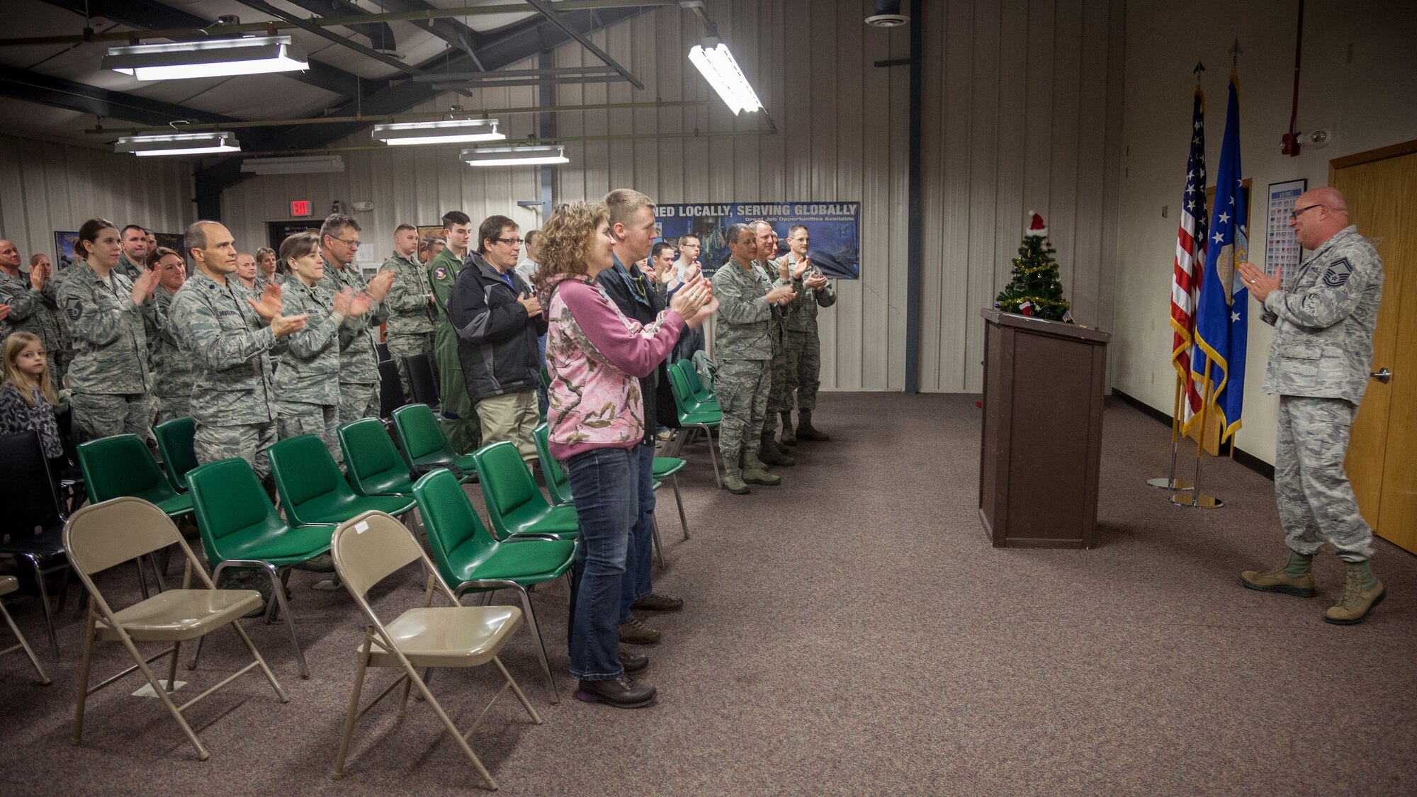 Senior Master Sgt. Donald Scott, 934th Development and Training Flight, retires with an informal send off from members of the 934th Airlift Wing Jan. 11 at the Minneapolis-St. Paul Air Reserve Station, Minn.  (U.S. Air Force photo by Shannon McKay/Released)