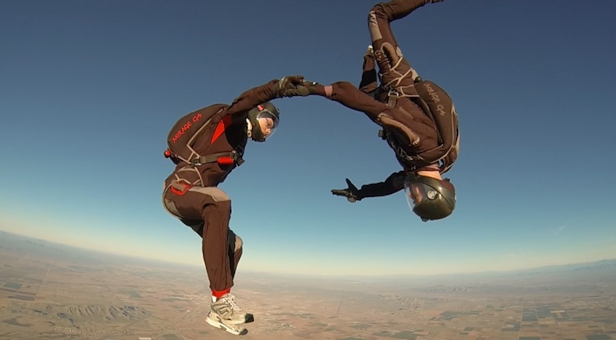 Team EagleBear in their 20th point of their national record-setting skydive. The Two-Way Vertical Formation Skydiving team consists of brothers, Andre Gerner (left), a masters animation student at UCLA and Cadet 2nd Class Joseph Gerner (right), an aeronautical engineering major at the Academy.