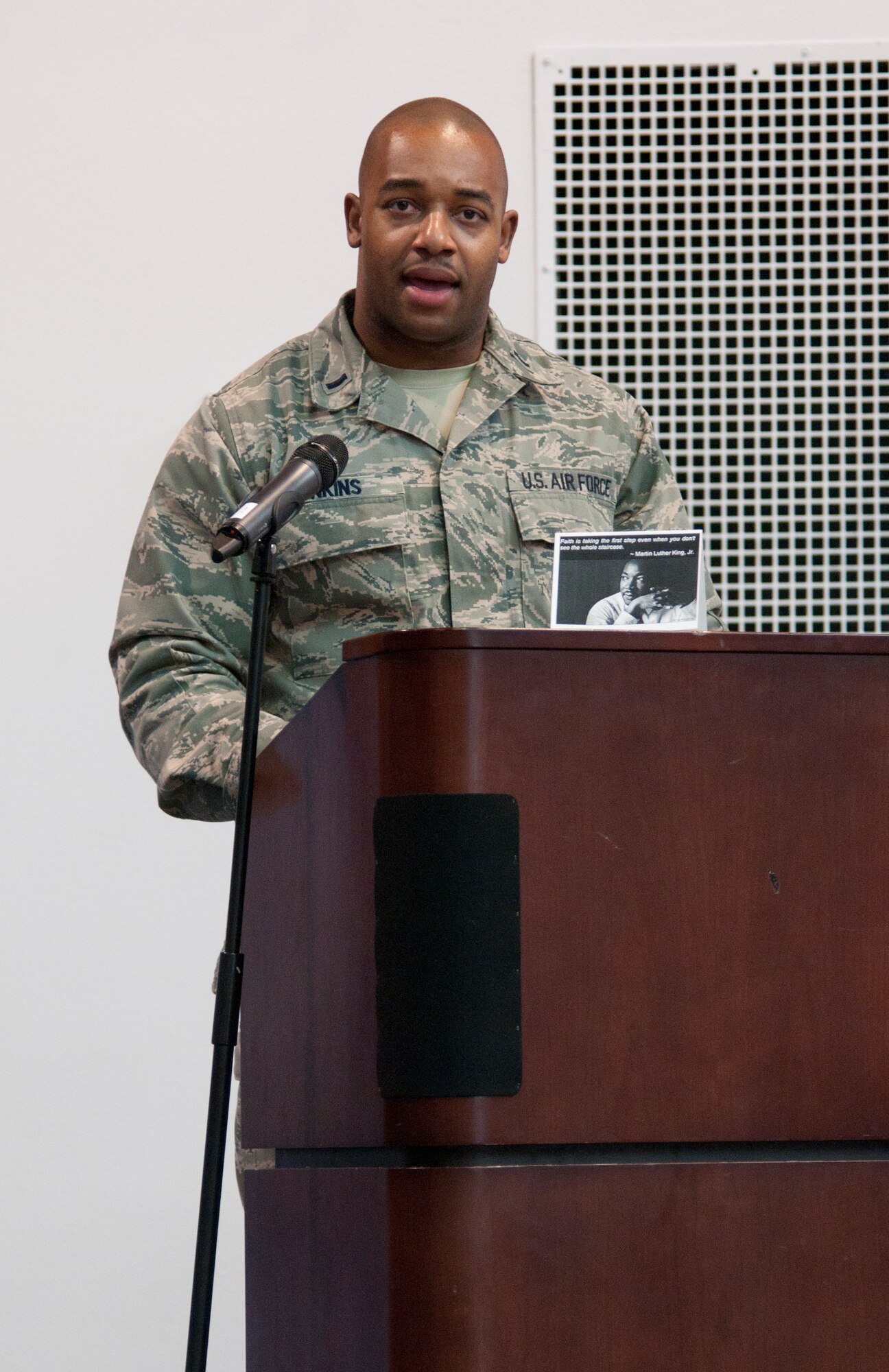 First Lt. Kenneth Jenkins, 90th Operations Group ICBM evaluation procedures chief, speaks to a crowd attending the 90th Missile Wing’s Dr. Martin Luther King, Jr., remembrance luncheon Jan 15, 2015, in the Fall Hall Community Center on F.E. Warren Air Force Base, Wyo. Jenkins was one of two guest speakers at the event. (U.S. Air Force photo by Senior Airman Jason Wiese)