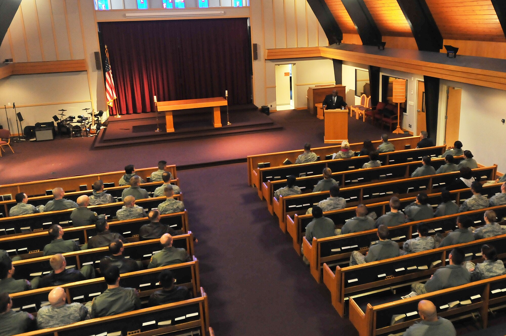 Team Fairchild members listen as Rev. Percy “Happy” Watkins recites the speech “I have a dream” by Dr. Martin Luther King Jr. Jan. 14, 2015 at Fairchild Air Force Base, Wash. Watkins is a local reverend in Spokane, Wash., and was stationed at Fairchild decades ago when he was in the Air Force. (U.S. Air Force photo/Staff Sgt. Veronica Montes)