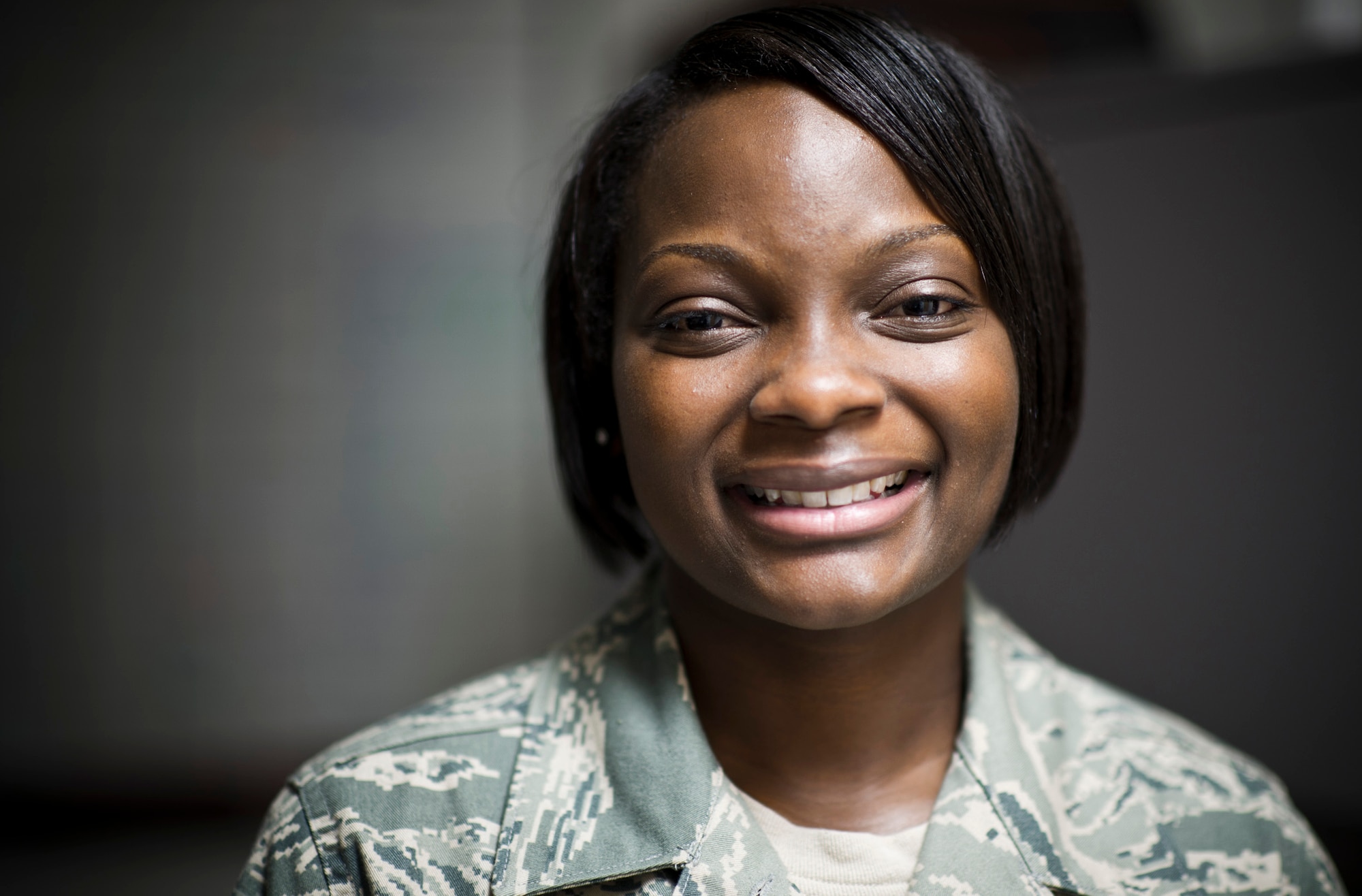 Staff Sgt. Raven Taylor, 374th Medical Operations Squadron medical technician, smiles for a photo at Yokota Air Base, Japan, July 8, 2011. In 2011, Taylor was selected as one of the 12 Outstanding Airmen of the Year. She became a focal point for enlisted affairs and worked to improve the Air Force as a whole with Chief Master Sgt. James Roy, then-chief master sergeant of the Air Force.(U.S. Air Force photo/Staff Sgt. Samuel Morse)