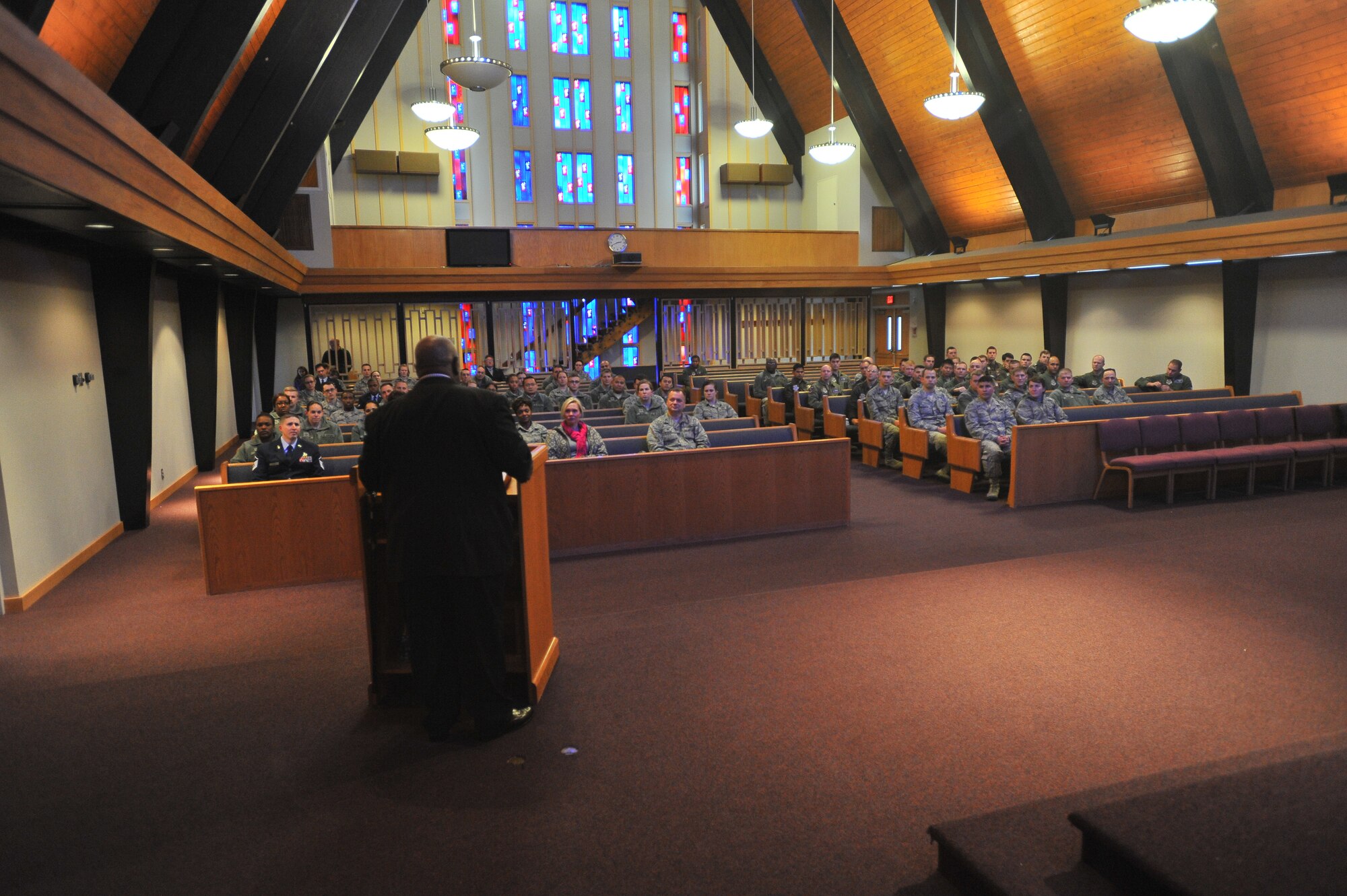 Team Fairchild members listen as Rev. Percy “Happy” Watkins recites the speech “I have a dream” by Dr. Martin Luther King Jr. Jan. 14, 2015 at Fairchild Air Force Base, Wash. Watkins is a local reverend in Spokane, Wash., and was stationed at Fairchild decades ago when he was in the Air Force. (U.S. Air Force photo/Staff Sgt. Veronica Montes)