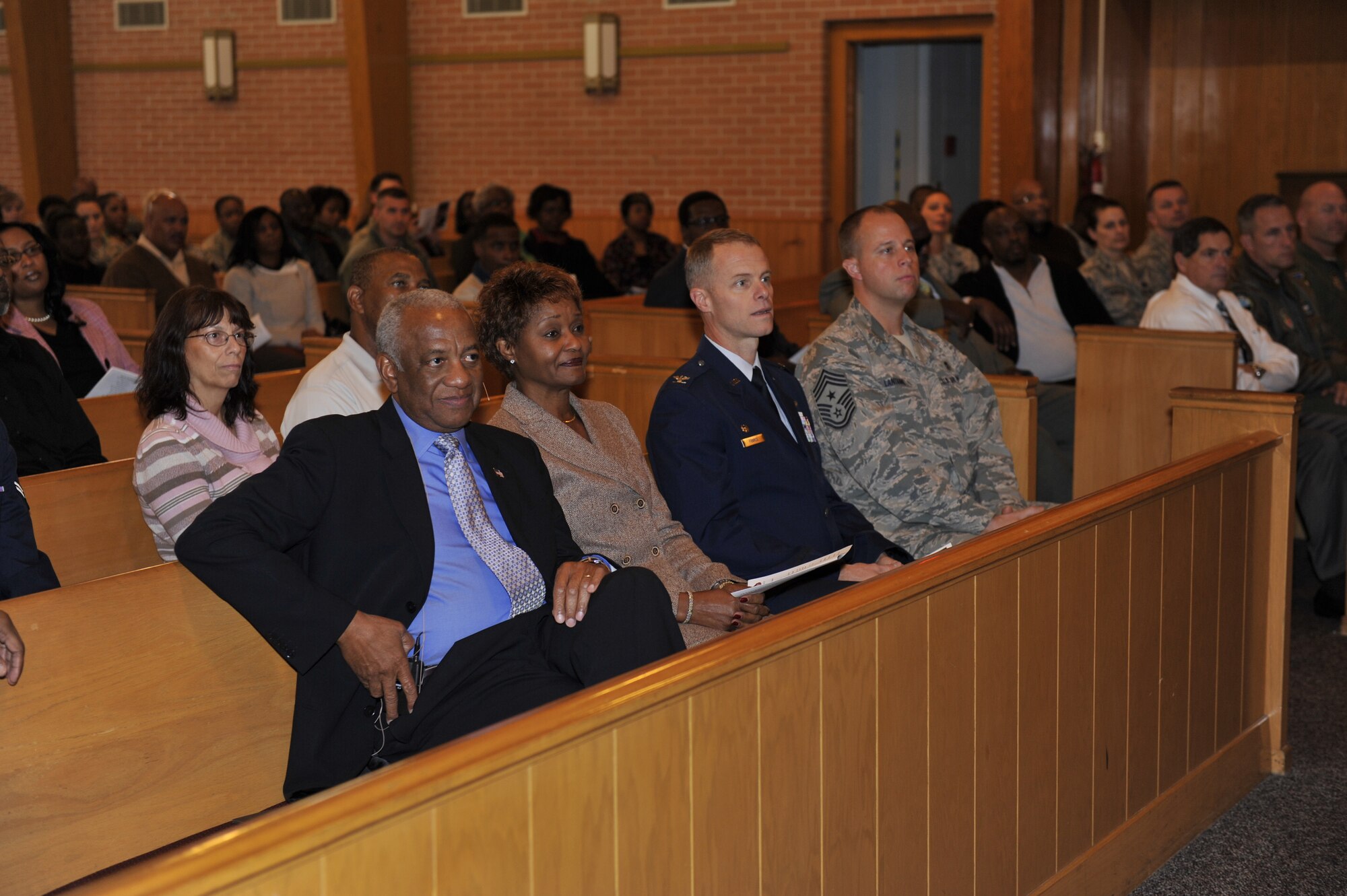 Floyd W. Newton, U.S. Air Force General retired, and his wife sit next to base leadership Jan. 15 at Tyndall’s Chapel 2 during the Martin Luther King Jr. commemoration service. The Tyndall Black Heritage Committee hosted a commemoration service for Martin Luther King Jr. and what he accomplished for civil rights. (U.S. Air Force photo by Airman 1st Class Sergio A. Gamboa/Released)