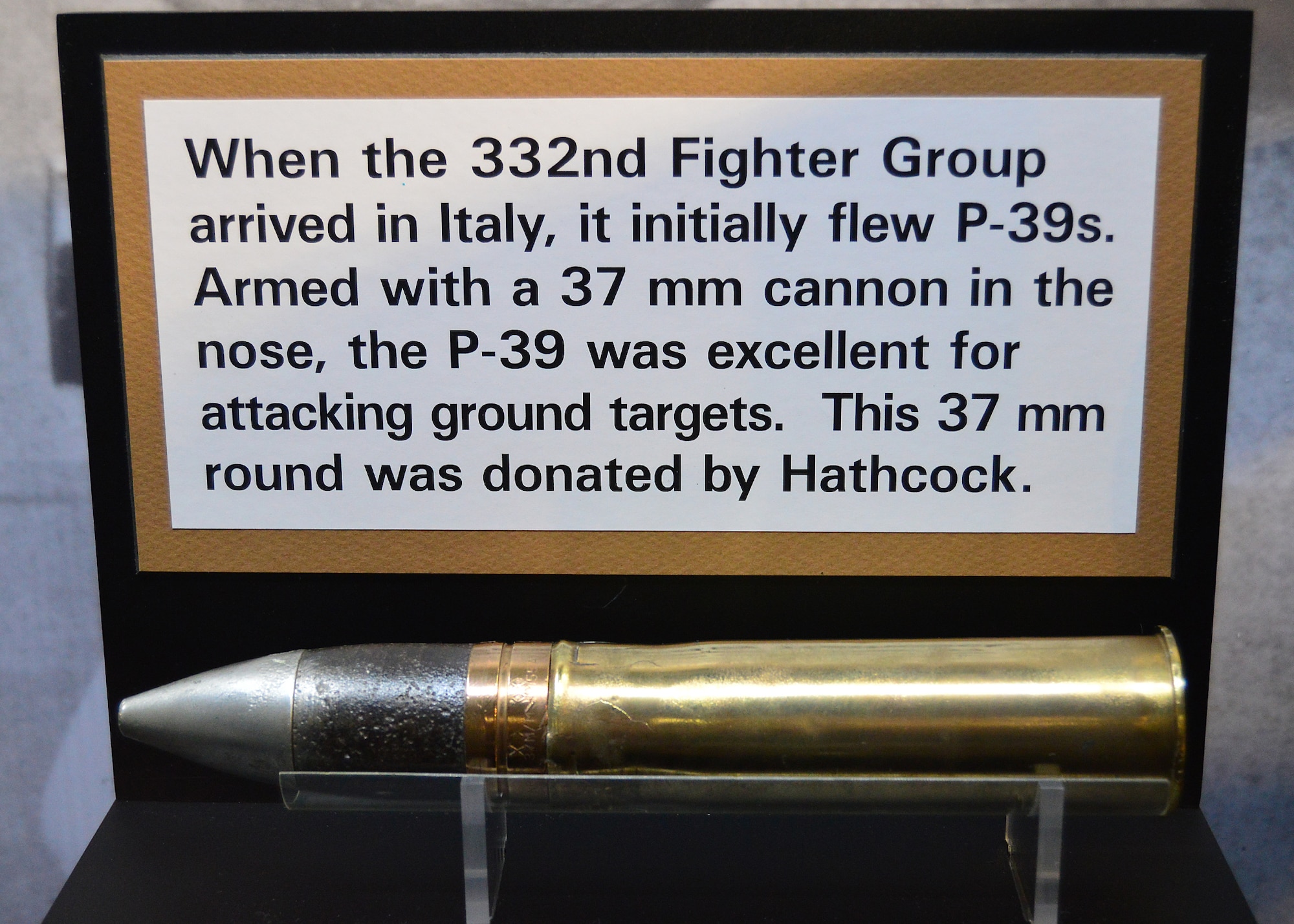 DAYTON, Ohio -- Maj. Hathcock donated this 37mm cannon round on display in the WWII Gallery at the National Museum of the U.S. Air Force. Captured in Italy during the summer of 1944, Lt. (later Maj.) Lloyd "Scotty" Hathcock spent the rest of the war in Stalag Luft III and Stalag VII-A prison camps. After the war, Hathcock stayed in the service and helped to desegregate the U.S. Air Force. (U.S. Air Force photo)
