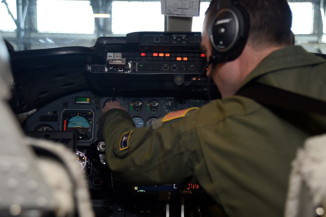 Capt. Jacob Buckman, 457th Airlift Squadron pilot, performs a pre-flight check on the instrument panel of a C-21 at Joint Base Andrews, Md., Jan. 9, 2015. The check allows the crew to ensure the aircraft is safe and ready to fly. (U.S. Air Force photo/Airman 1st Class Ryan J. Sonnier)