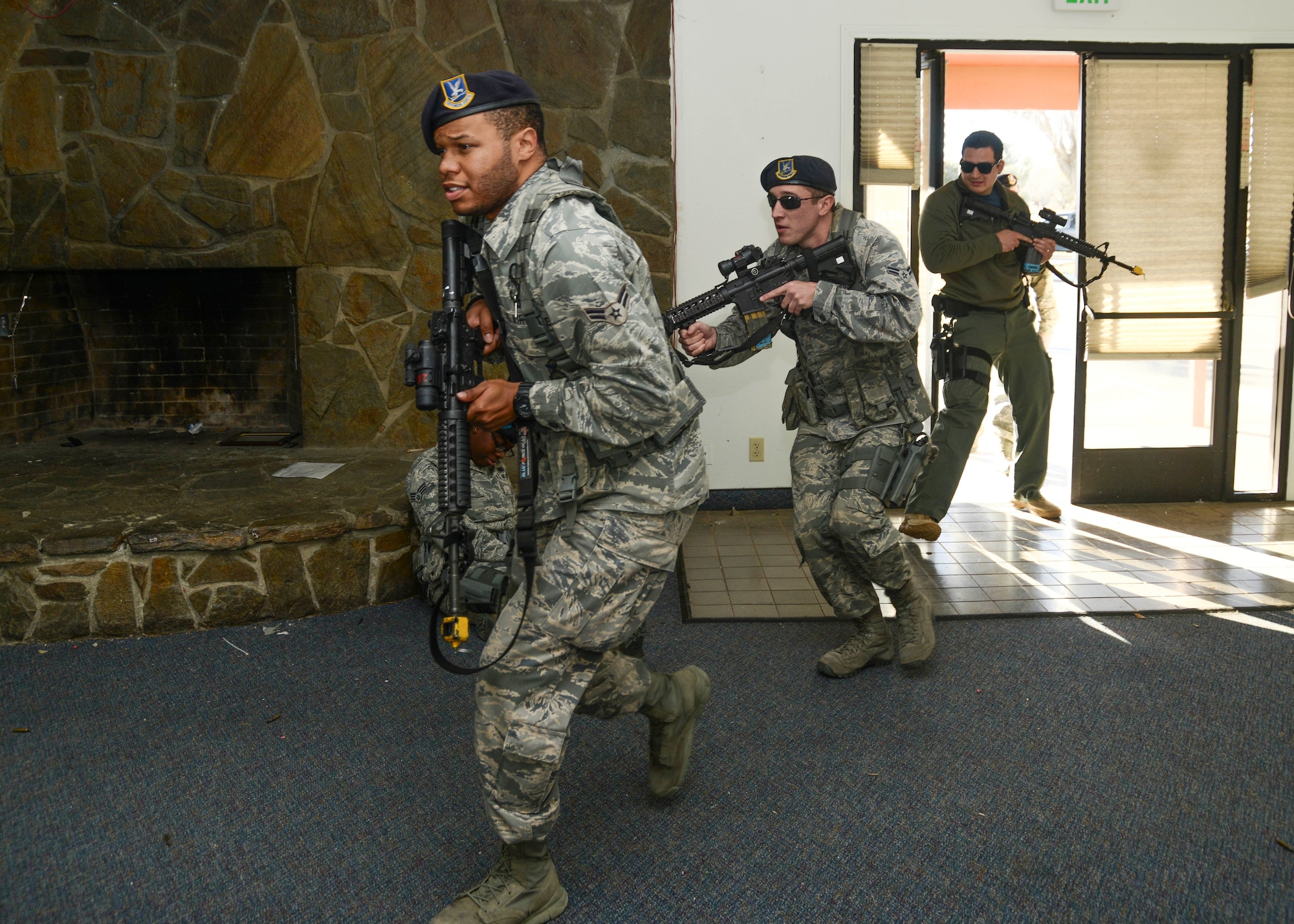 During a 412th Security Forces Squadron active shooter training event, Airman 1st Class Geremi Long, Airman 1st Class Jay Prather and Officer Melo-Trejos entered the facility with one goal - find and eliminate the threat as quickly as possible. (U.S. Air Force photo by Rebecca Amber)