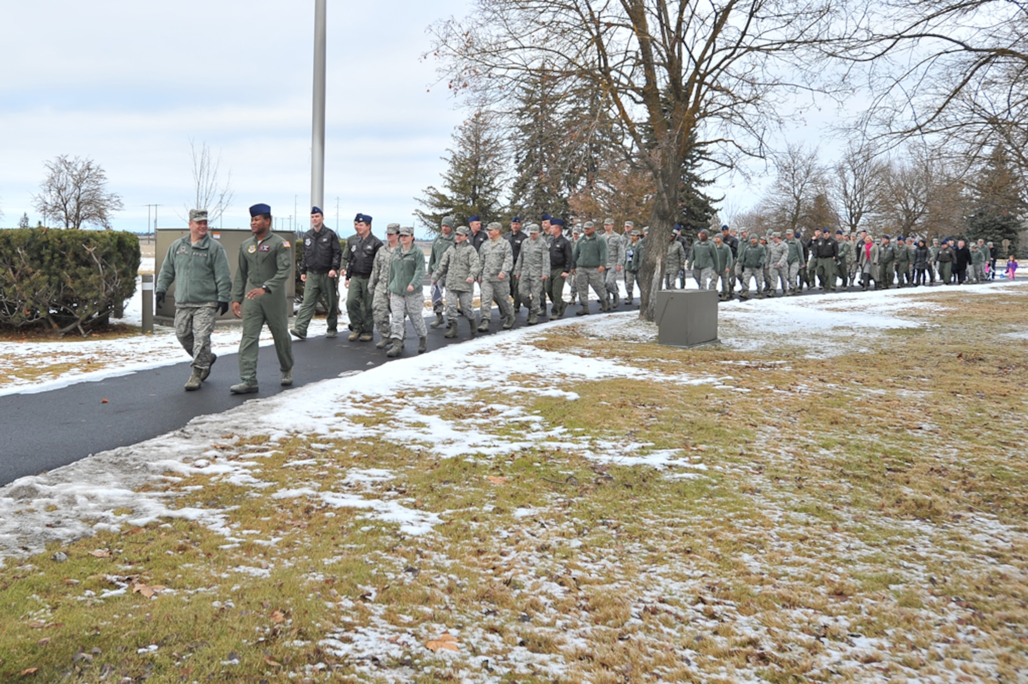 Team Fairchild members conduct a march in remembrance of Dr. Martin Luther King Jr.’s birthday Jan. 14, 2015, at Fairchild Air Force Base, Wash.  The march was followed by a guest speaker, Rev. Percy “Happy” Watkins, who recited King’s “I have a dream” speech. (U.S. Air Force photo/Staff Sgt. Veronica Montes)
