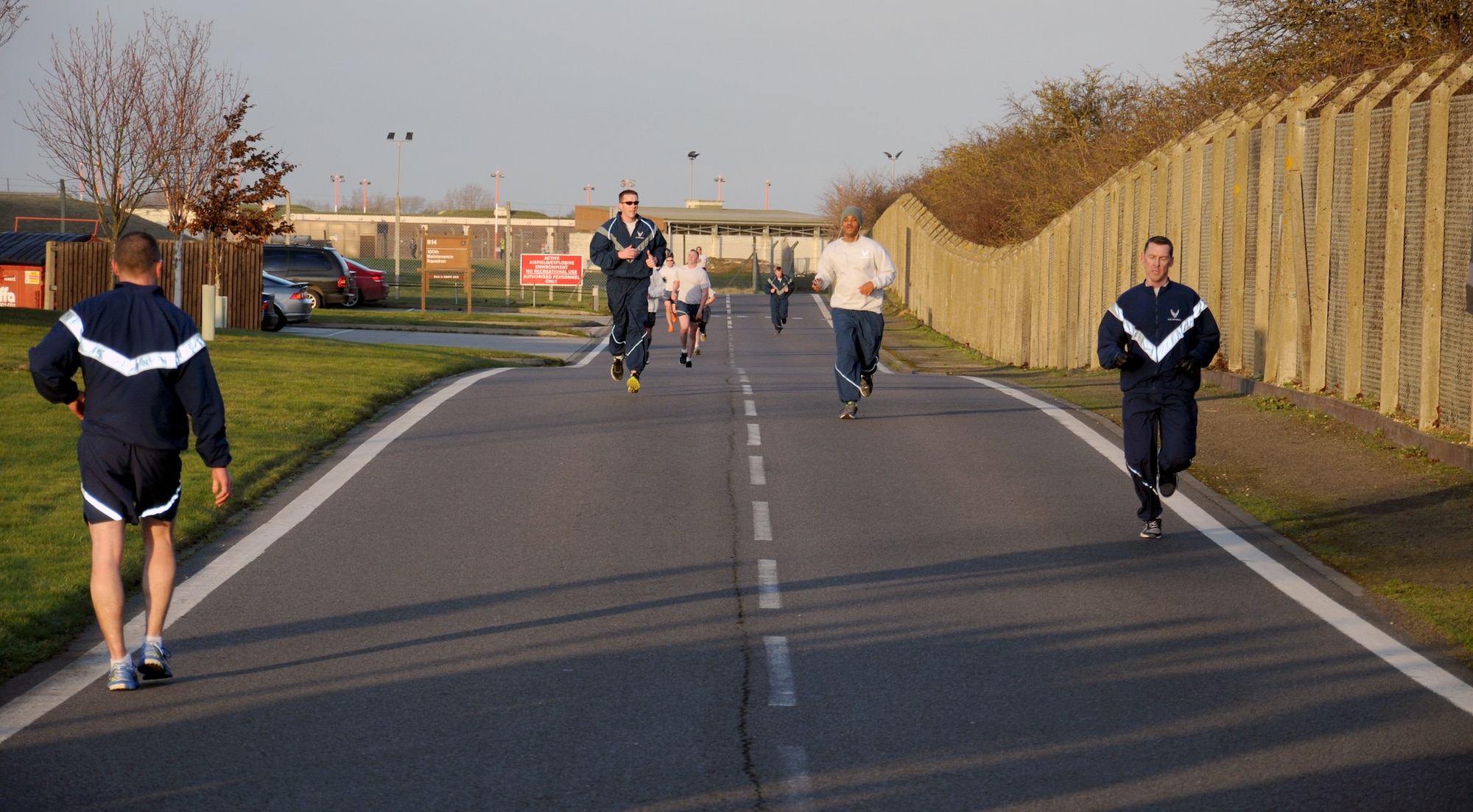 Team Mildenhall members take part in the monthly wing run Jan. 16, 2015, near the Hardstand Fitness Center on RAF Mildenhall, England. The monthly 5k run encourages morale and camaraderie throughout the base through exercise and healthy competition. (U.S. Air Force photo by Gina Randall/Released)