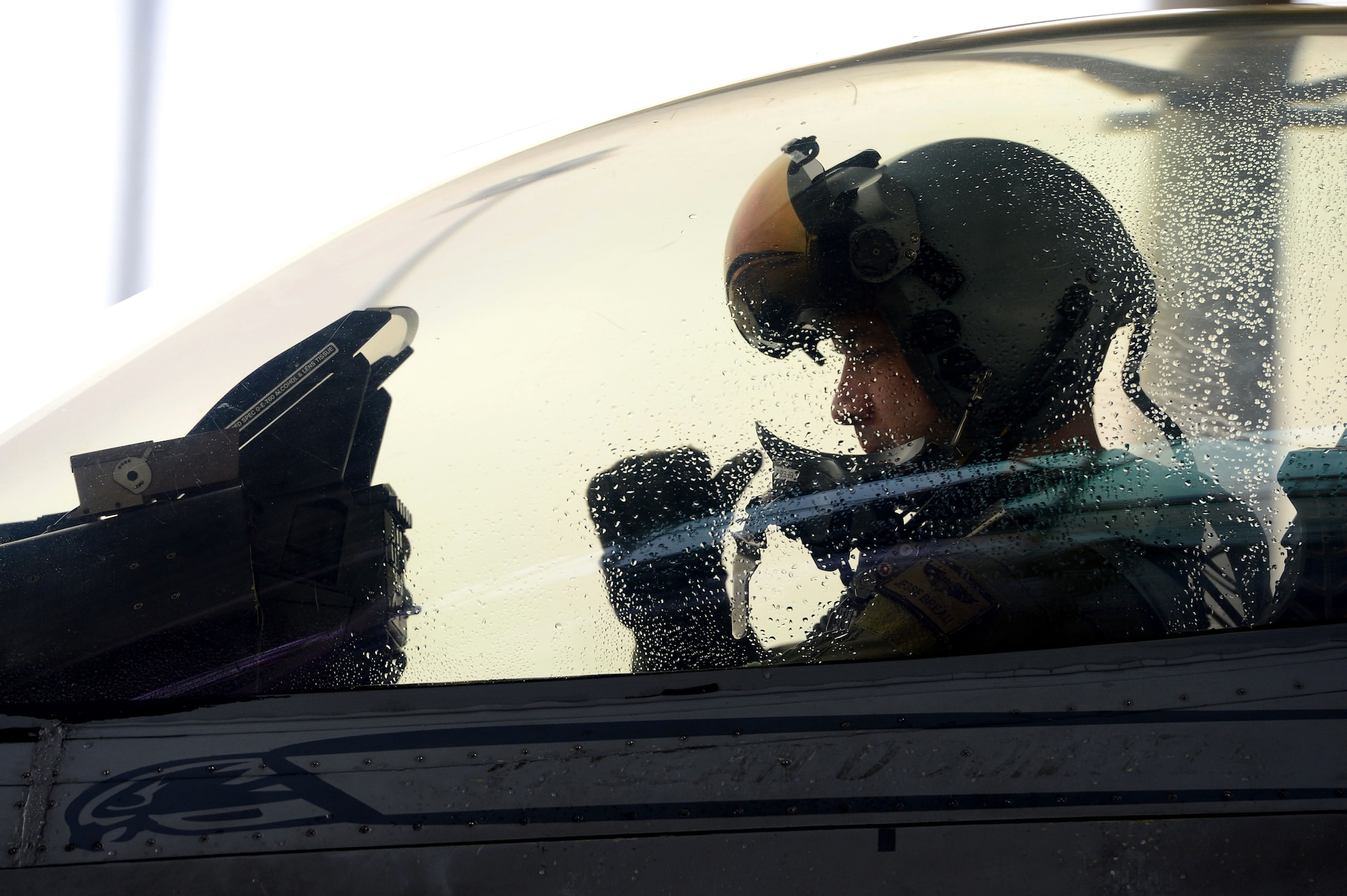 A U.S. Air Force F-16CM Fighting Falcon pilot assigned to the 55th Fighter Squadron prepares to taxi onto the runway at Shaw Air Force Base, S.C., Jan. 13, 2015. Pilots flew several day and night sorties as part of a five-day surge to keep the readiness and capability of the 20th Maintenance Group high. (U.S. Air Force photo by Senior Airman Jensen Stidham/Released)  