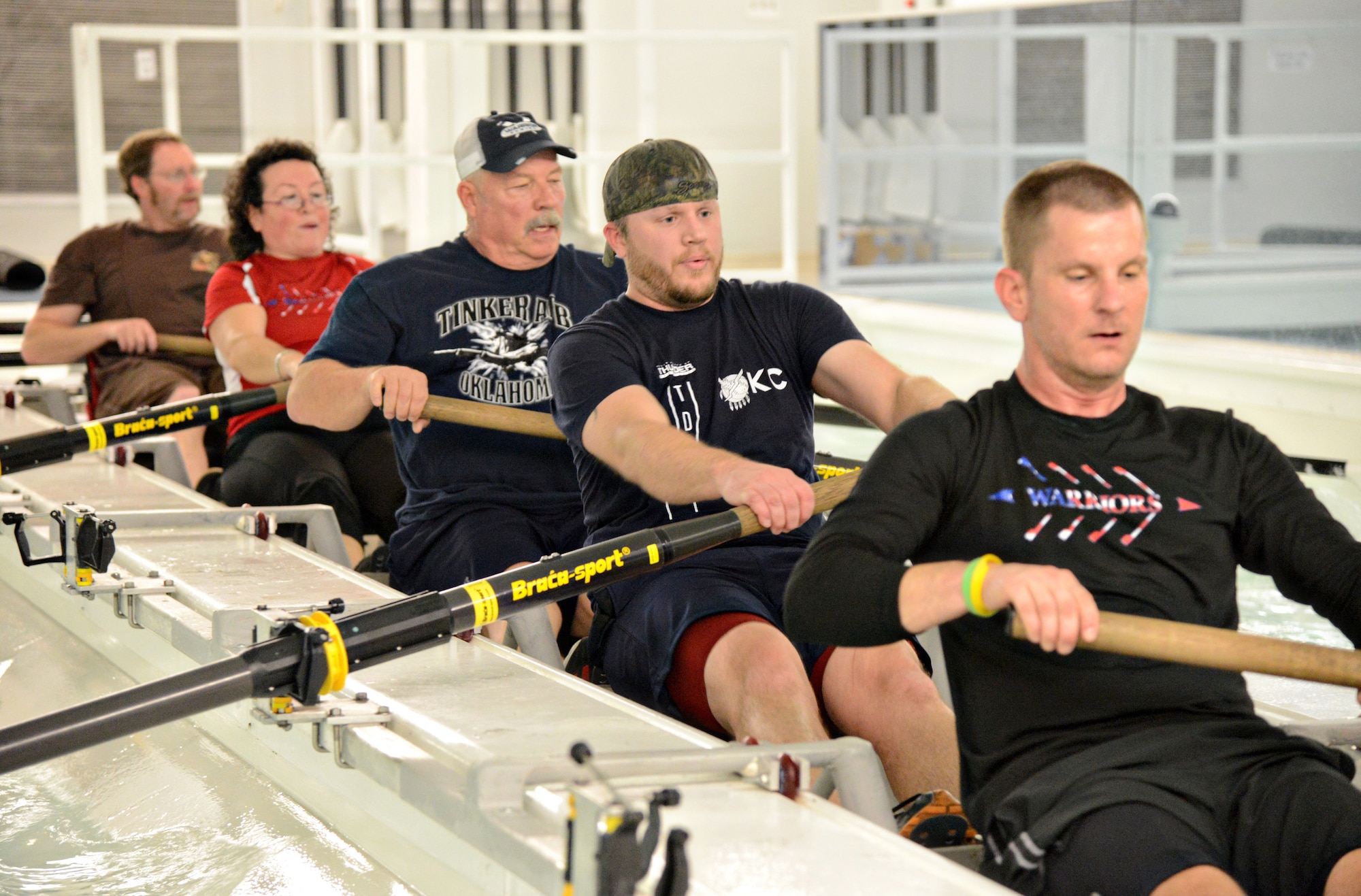 Several members of the Warrior Rowing Team practice at the Devon Boathouse. The team is made up of veterans who need sports and recreational therapy to assist in their recovery from injuries and illness obtained through their military service. Attending members include, from the front, Andrew Johnson, retired Navy and Warriors co-captain; Beau Baker, retired Army and an engine mechanic with the 76th Propulsion Maintenance Group; Wayne Sadowski, retired Air Force master sergeant and and member of the Air Force Life Cycle Management Center; Nadine Lewis, retired U.S. Coast Guard; and Will Smith, retired Army. (Air Force photo by Kelly White)