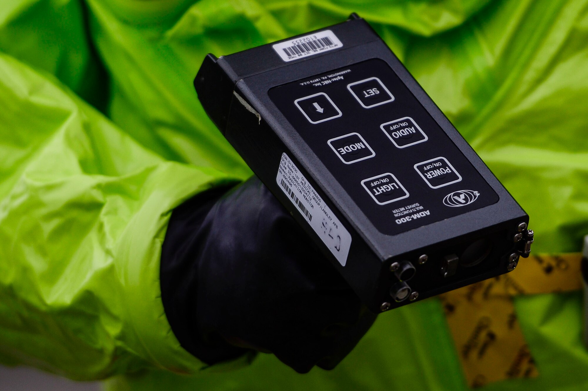 U.S. Air Force Airmen test for potential hazardous materials during an Integrated Base Emergency Response and Capability training at Langley Air Force Base, Va., Jan. 13, 2015. The training primarily focuses on bioenvironmental engineering, civil engineer emergency management and fire emergency services to train response capabilities in the event of a chemical, biological, radiological, nuclear and high-yield explosive threat. (U.S. Air Force photo by Senior Airman Kayla Newman/Released) 