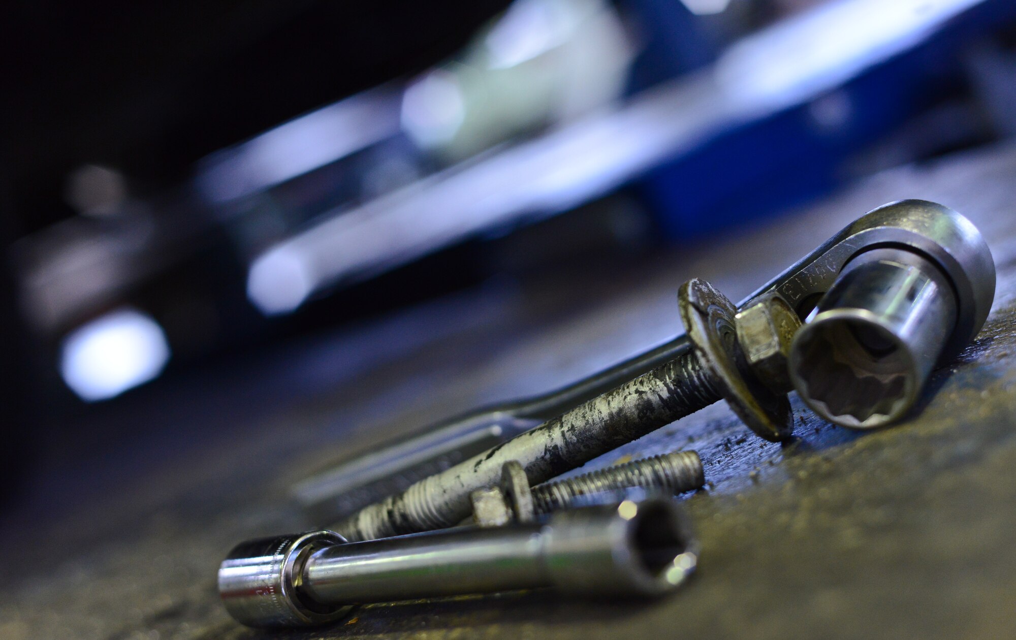Tools rest on a vehicle lift at Ramstein Air Base, Germany, Jan. 14, 2015. The 86th Vehicle Readiness Squadron general purpose light vehicle flight services vehicles from sedans to heavy-duty trucks. (U.S. Air Force photo by Senior Airman Nicole Sikorski/Released)