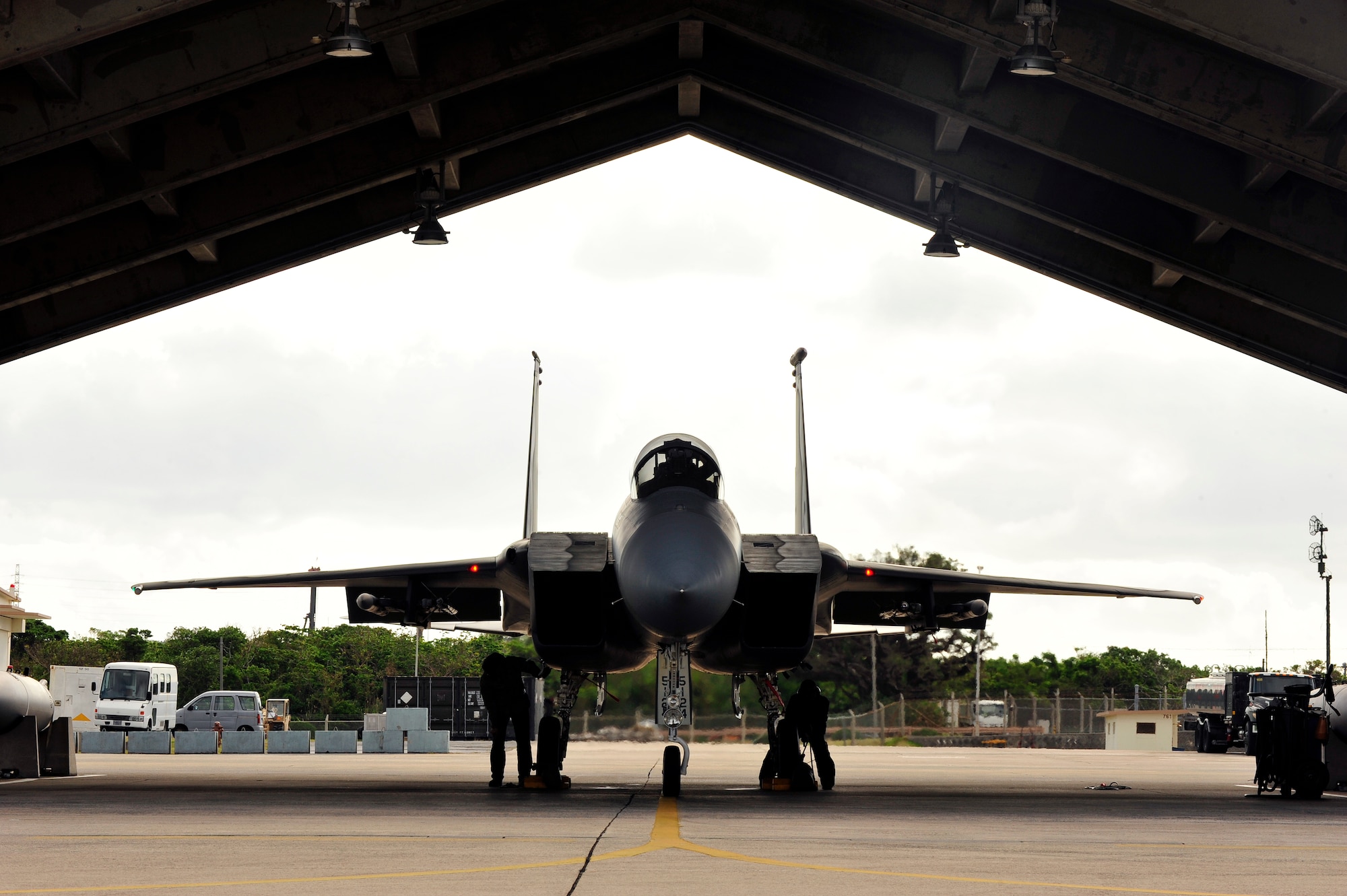 U.S. Air Force Airmen from the 44th Aircraft Maintenance Unit prepare an F-15C Eagle for a training surge on Kadena Air Base, Japan, Jan. 15, 2015. The 44th Fighter Squadron usually conducts training surges three to four times a year. When executed properly, it has a positive effect on unit pride and displays how effective Air Force maintenance practices are. (U.S. Air Force photo by Naoto Anazawa)