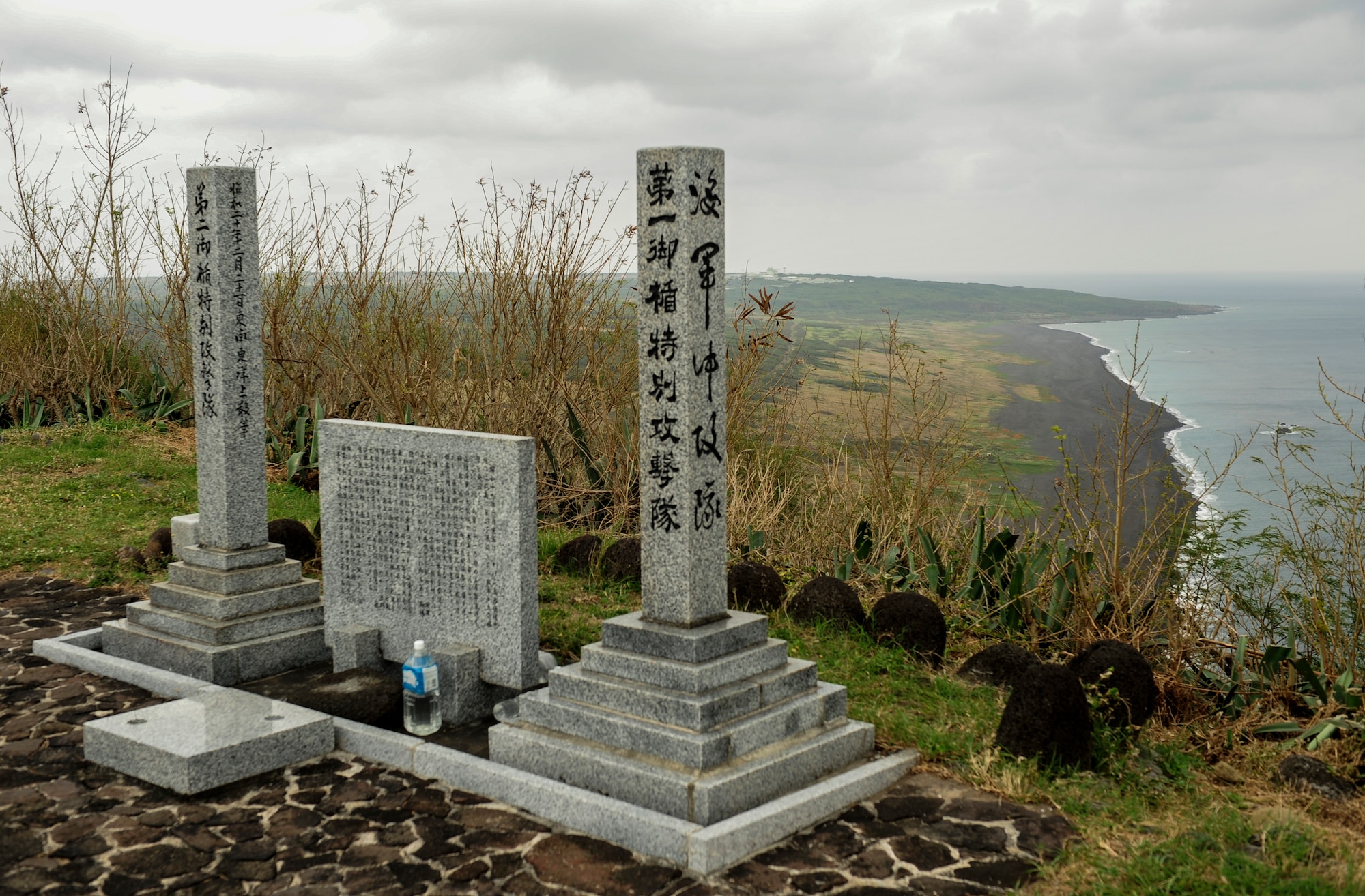 A memorial dedicated to fallen U.S. and Japanese military during the battle of Iwo Jima rests on top of Mount Suribachi on Iwo To, Japan Jan. 8, 2015. Approximatley 25,000 American and Japanese troops died during the 36-day battle. Other memorials and reminders of the war can be found throughout the island. (U.S. Air Force photo by Airman 1st Class John Linzmeier)