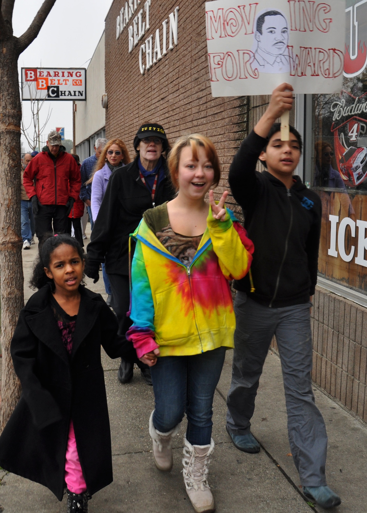 Marchers hold hands and signs during a during a Martin Luther King community event, Saturday, Jan. 17, 2015 in Marysville, Calif. (U.S. Air Force photo by Tech. Sgt. Heather Rose Skinkle/Released)
