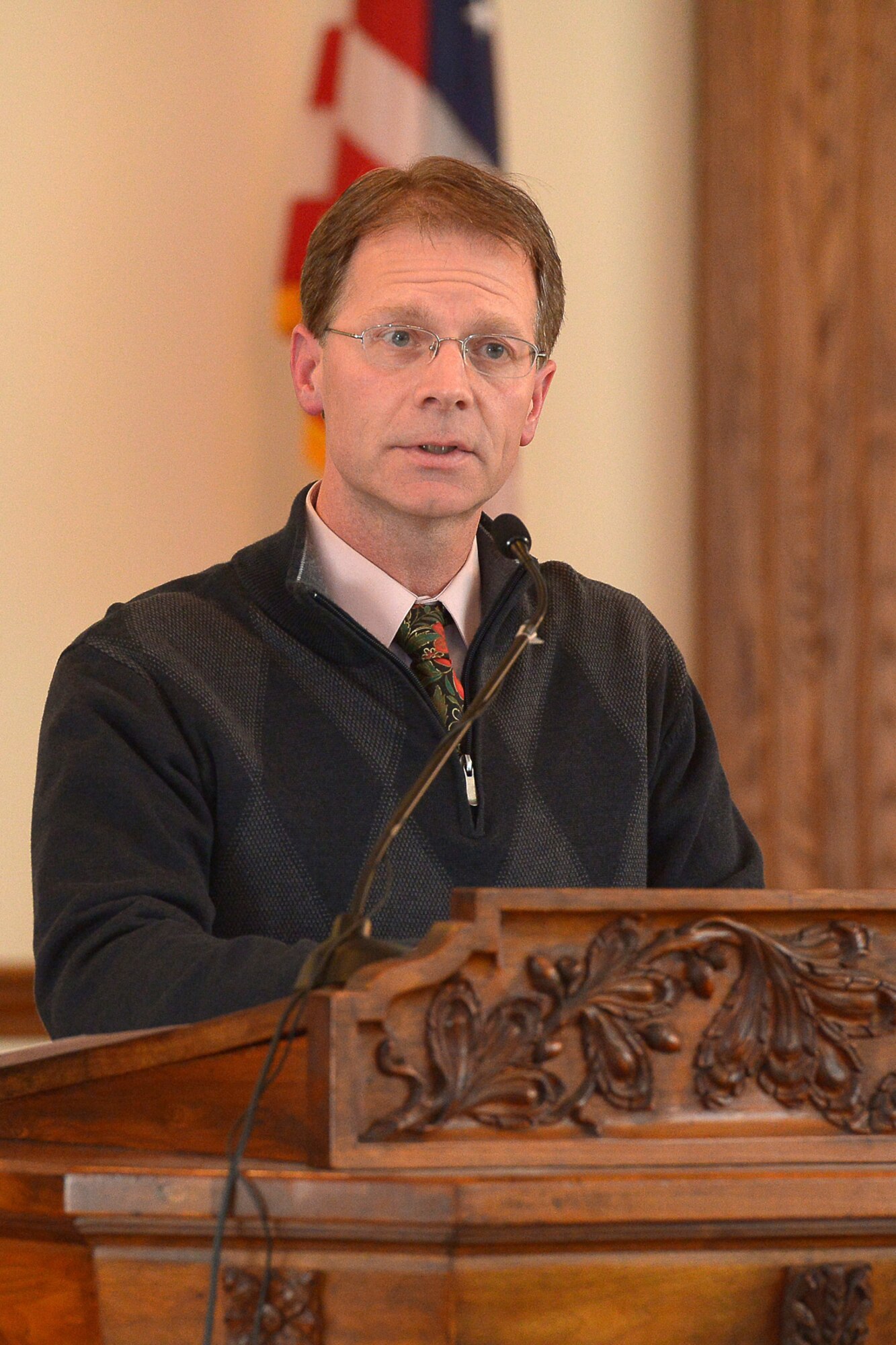 Lance Beebe, Dr. Martin Luther King, Jr. remembrance committee member, thanks members of the Hanscom community for attending the MLK remembrance celebration at the base chapel Jan. 16. This year’s MLK observance focused on the theme “Remember! Celebrate! A Day of Service.” (U.S. Air Force photo by Jerry Saslav)