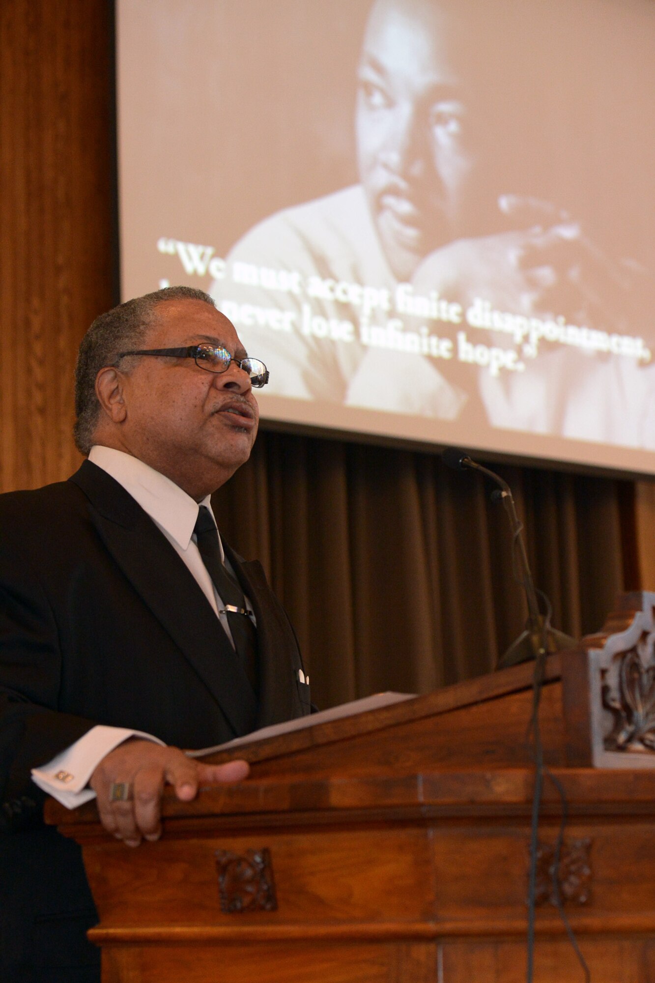 Timothy Martin, 66th Security Forces Squadron, reenacts the Dr. Martin Luther King, Jr. “I Have a Dream” speech during an MLK birthday celebration at the base chapel Jan. 16. This year’s MLK observance focused on the theme “Remember! Celebrate! A Day of Service.” President Ronald Reagan signed a bill into law Nov. 2, 1983 at the White House declaring the third Monday in January each year as a federal holiday to honor King, which is around the time of his birthday, Jan. 15. The holiday was first observed Jan. 20, 1986. (U.S. Air Force photo by Jerry Saslav)