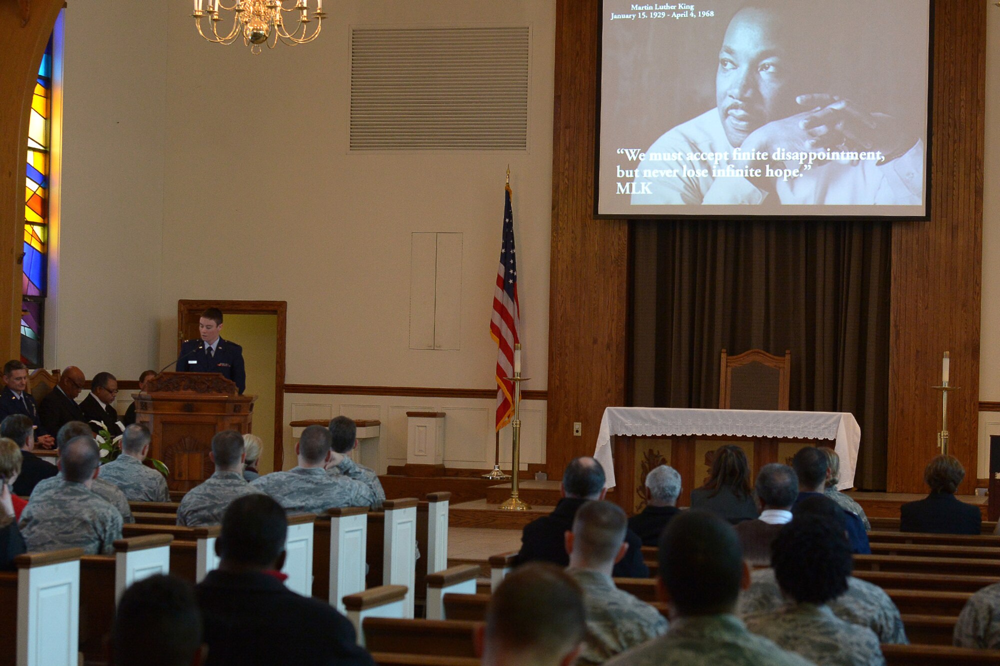 Members of the Hanscom community attend a Dr. Martin Luther King, Jr. celebration at the base chapel Jan. 16. The event featured an "I Have a Dream" speech reenactment by Timothy Martin, 66th Security Forces Squadron, and special music performed by Maresa Kelleher and Kathy Lynch. (U.S. Air Force photo by Jerry Saslav)