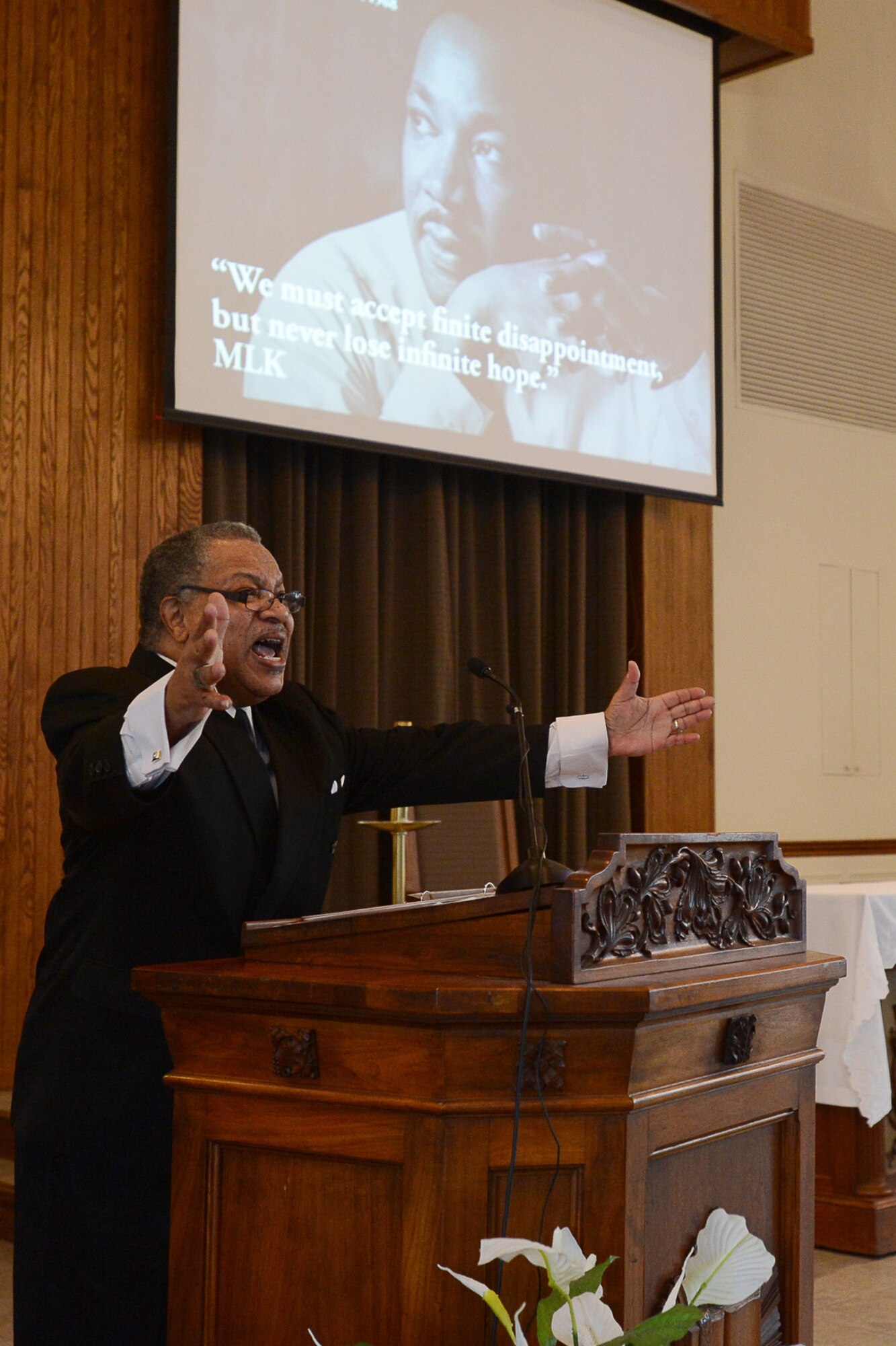 Timothy Martin, 66th Security Forces Squadron, reenacts the Dr. Martin Luther King, Jr. “I Have a Dream” speech during an MLK birthday celebration at the base chapel Jan. 16. This year’s MLK observance focused on the theme “Remember! Celebrate! A Day of Service.” (U.S. Air Force photo by Jerry Saslav)