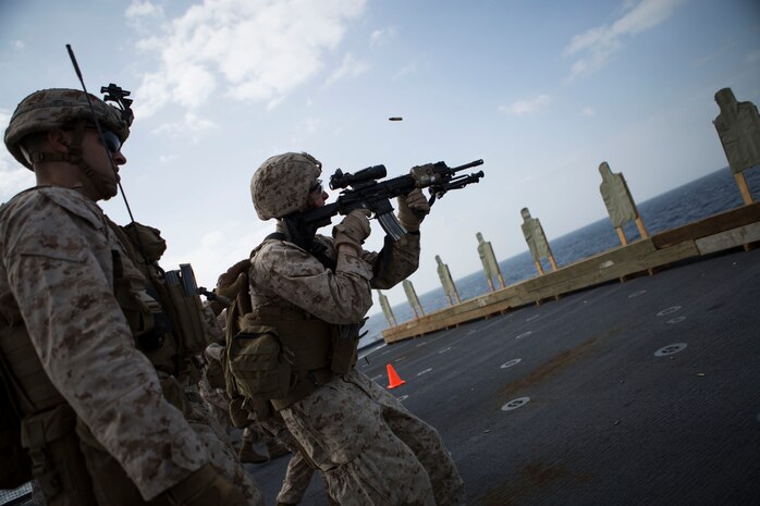 Marines with Kilo  Company, Battalion Landing Team 3rd Battalion, 6th Marine Regiment, 24th Marine Expeditionary Unit, take part in a live-fire exercise aboard the amphibious dock landing ship USS Fort McHenry (LSD 43), Jan. 16, 2015. The 24th MEU is embarked on the ships of the Iwo Jima Amphibious Ready Group and deployed to maintain regional security in the U.S. 5th Fleet area of operations.(U.S. Marine Corps photo by Sgt. Devin Nichols)