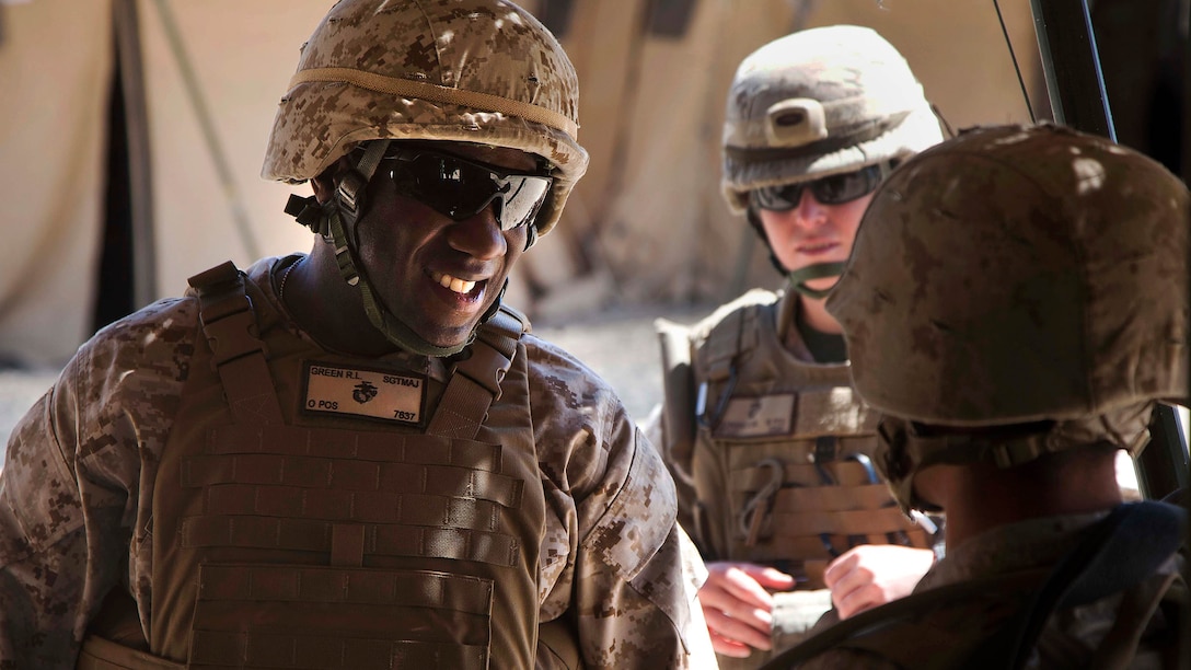 In this 2013 image, Sgt. Maj. Ronald L. Green, then serving as the sergeant major of 1st Marine Expeditionary Force, speaks with Marines participating in Exercise Desert Scimitar during a battlefield circulation aboard Marine Corps Air Ground Combat Center Twentynine Palms, California, May 3, 2013. (U.S. Marine Corps photo by Lance Cpl. Ismael E. Ortega/Released)