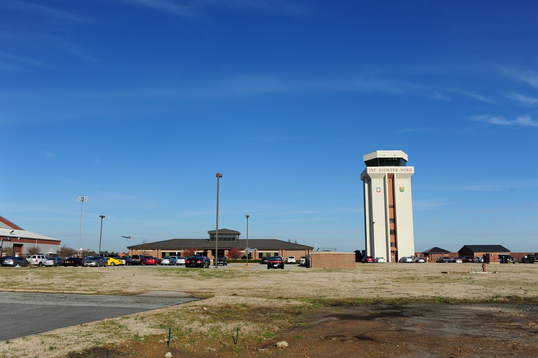 An F-22 Raptor takes off after receiving confirmation from the 1st Operations Support Squadron air traffic control tower at Langley Air Force Base, Va., Jan. 20, 2015. The control tower supports approximately 30,000 missions annually and communicates with local flight facilities to coordinate safe air traffic. (U.S. Air Force photo by Staff Sgt. Natasha Stannard/Released)