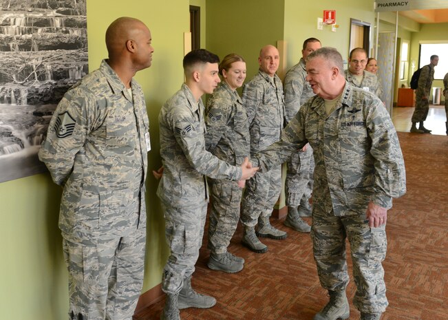 Lt. Gen. (Dr.) Thomas W. Travis, Air Force Surgeon General, shakes hands with Airmen during a tour of the base clinic at Beale Air Force Base, Calif., Jan. 14, 2015. Travis is responsible for 44,000 medical professionals throughout the Air Force. (U.S. Air Force photo by John Schwab/Released)