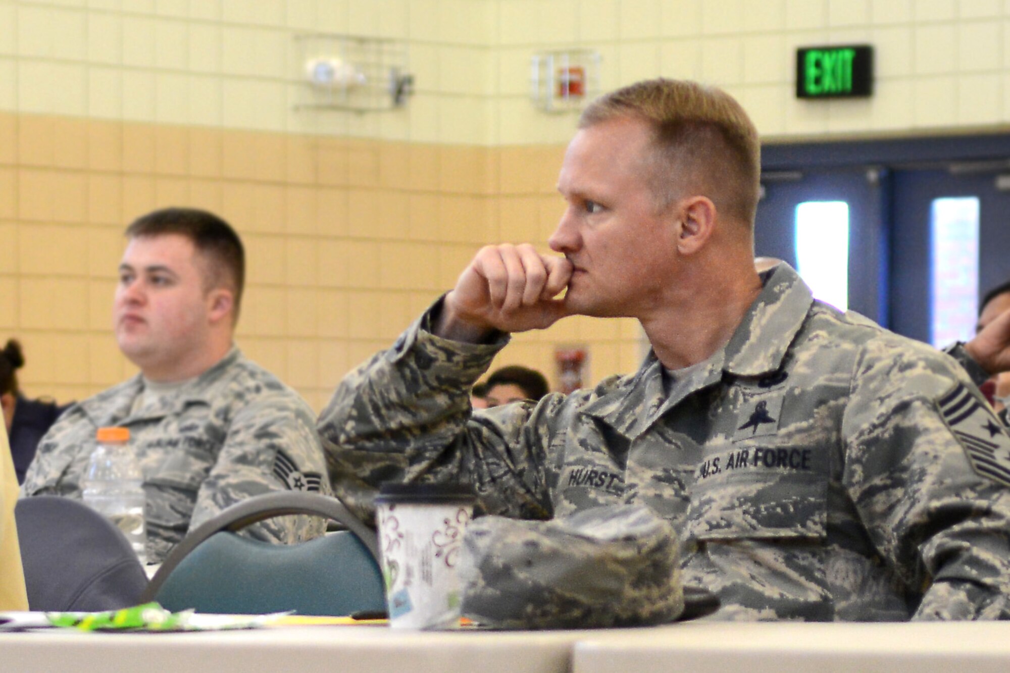U.S. Air Force Chief Master Sgt. Mark Hurst, 633rd Air Base Wing command chief, listens to a TriCare briefing at Langley Air Force Base, Va., Jan. 20, 2015. Hurst, the new 633rd ABW command chief, said Right Start provides the tools for he and his family to become part of the great team at Joint Base Langley-Eustis. (U.S. Air Force photo by Airman 1st Class Devin Scott Michaels/Released)