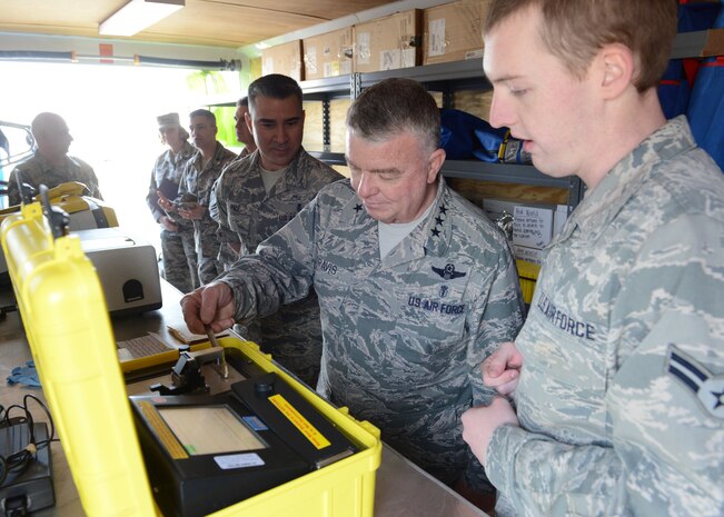 Lt. Gen. (Dr.) Thomas W. Travis (center), Air Force Surgeon General, visits the Bioenvironmental Engineering Flight at Beale Air Force Base, Calif., Jan. 14, 2015. Travis toured Beale to gain a better understanding of the Wing’s medical missions. (U.S. Air Force photo by John Schwab/Released)  