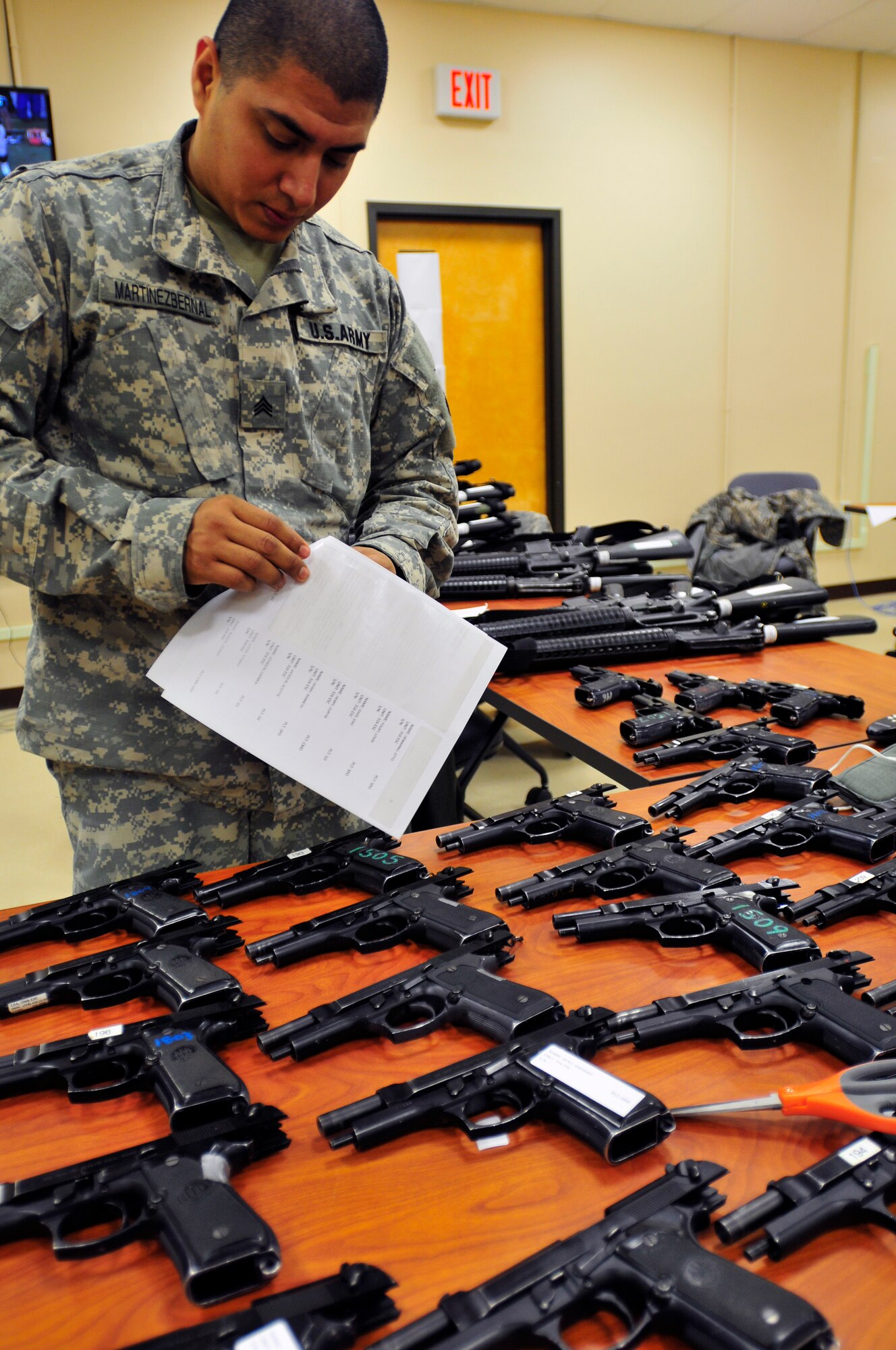 Sgt. Arnaldo Martinez, from Chicago, a supply sergeant with the U.S. Army Reserve's 316th Sustainment Command (Expeditionary), prepares weapons for issue during Warrior Exercise 78-15-01 at Joint Base McGuire-Dix-Lakehurst N.J., Jan. 18, 2015. Approximately 4,000 active duty, National Guard, Army Reserve and U.S. Navy personnel are participating in WAREX 78-15-01 at multiple locations in the eastern U.S. (U.S. Army photo by Sgt. Christopher Bigelow/Released)