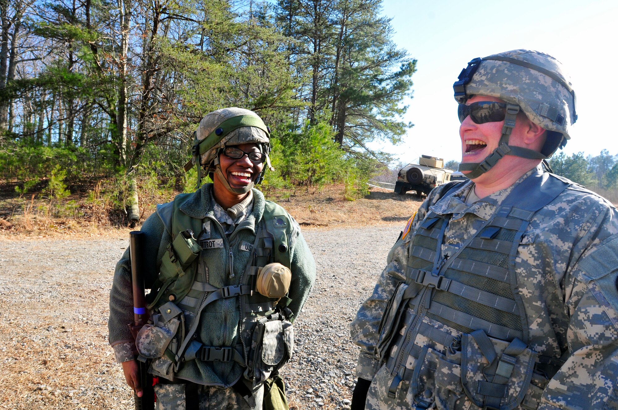 U.S. Army Reserve Soldiers Brig. Gen. Richard C. Staats and Sgt. Rochelle Liptrot, share a laugh during a visit to the troops engaged in Warrior Exercise 78-15-01 at Fort A.P. Hill, Va., Jan. 17, 2015. Staats, from Washington, D.C., is the commanding general of the 316th Sustainment Command (Expeditionary), and Liptrot, from Warren, Ohio, is a water treatment specialist with the 326th Quartermaster Company (Water Storage and Distribution). Approximately 4,000 active duty, National Guard, Army Reserve and U.S. Navy personnel are participating in the 78th Training Division's WAREX 78-15-01 at multiple locations in the eastern U.S. (Army Photo by Sgt. Christopher Bigelow/Released)
