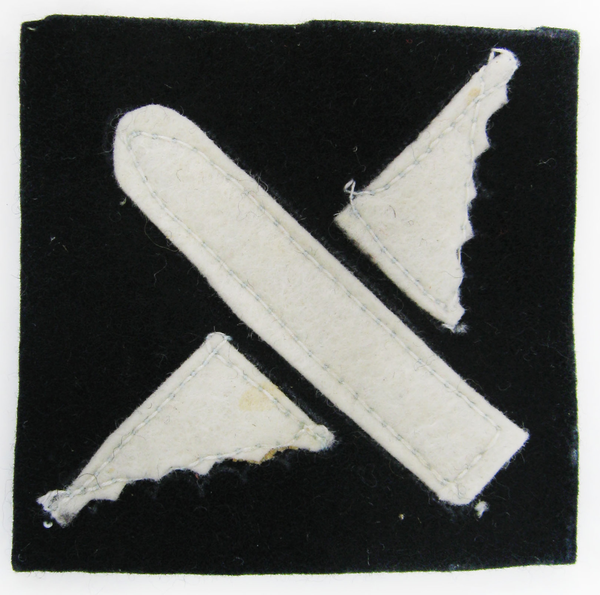 This winged ammunition patch is the insignia for U.S. anti-aircraft units during World War I. With anti-aircraft being in its wartime infancy during WWI, U.S. Army anti-aircraft personnel had to learn in the field. These soldiers quickly gained proficiency in how to set up the weapon and measure size, distance and speed of the target, all by hand, as instruments for this purpose had not yet been developed or produced. (U.S. Air Force photo)