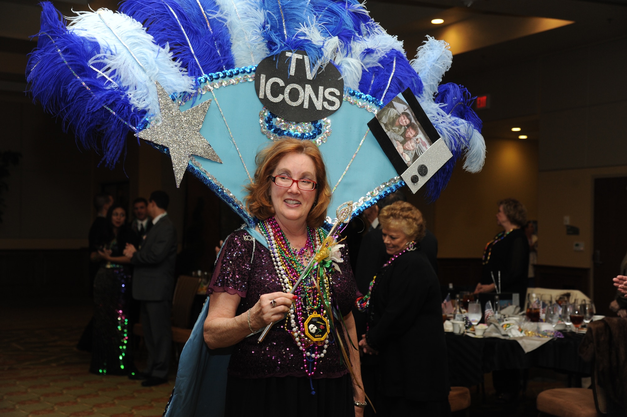 Sarah Jacobs, Krewe of Medic member, is crowned the 2015 Krewe of Medics Queen during the Keesler Medical Center’s 27th annual Krewe of Medics Mardi Gras Ball Jan. 17, 2015, at the Bay Breeze Event Center, Keesler Air Force Base, Miss.  The Krewe of Medics hosts a ball every year to give military personnel assigned to the Keesler Medical Center a taste of the South and an opportunity to experience a traditional Mardi Gras.  The theme of this year's ball was TV Icons. (U.S. Air Force photo by Kemberly Groue)