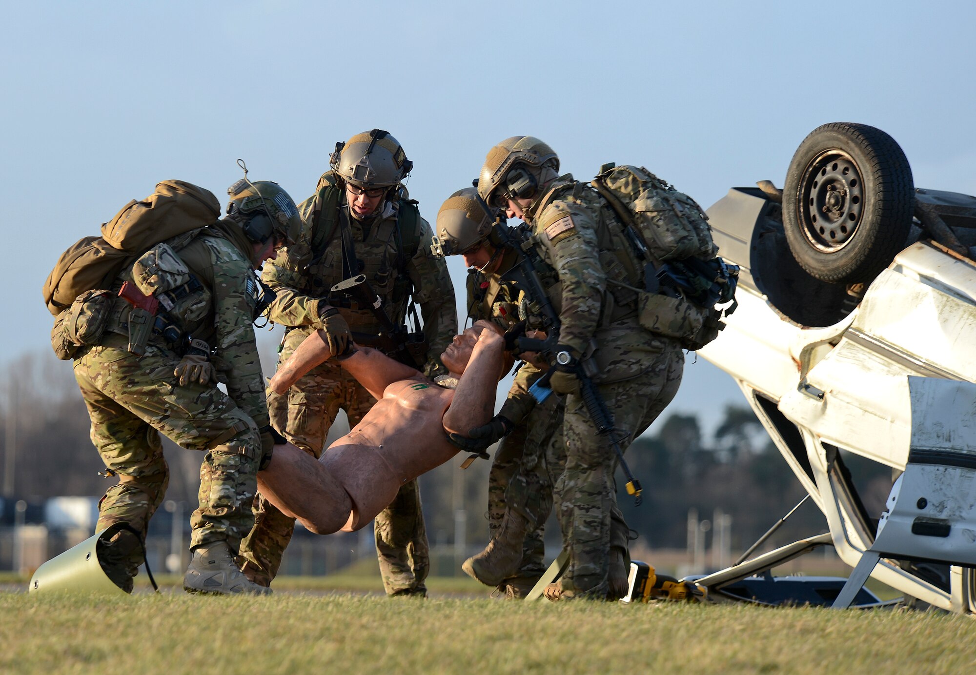 Pararescuemen assigned to the 56th Rescue Squadron evacuate a simulated casualty in a combat search and rescue scenario on Royal Air Force Lakenheath, England, Jan. 16, 2015. This demonstration was part of an Installation Excellence Selection Board visit to determine weather Joint Base Andrews or RAF Lakenheath will win the Commander in Chief’s Annual Award for Installation Excellence. (U.S. Air Force Photo/Airman 1st Class Trevor T. McBride/Released)