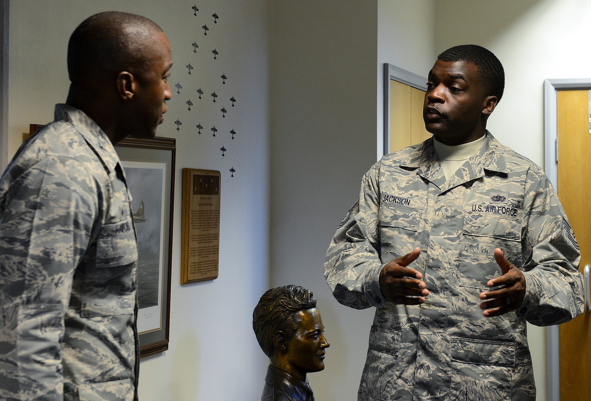 Tech Sgt. Nathan Jackson, 48th Force Support Squadron Airman Leadership School instructor, briefs the program to Col. Stacey Hawkins, 10th Air Base Wing commander, during an Installation Excellence Selection Board visit on Royal Air Force Feltwell, England, Jan. 15, 2015. The IESB visited the Liberty Wing to determine the winner of the Commander in Chief’s Annual Award for Installation Excellence. (U.S. Air Force Photo/Airman 1st Class Trevor T. McBride/Released) 